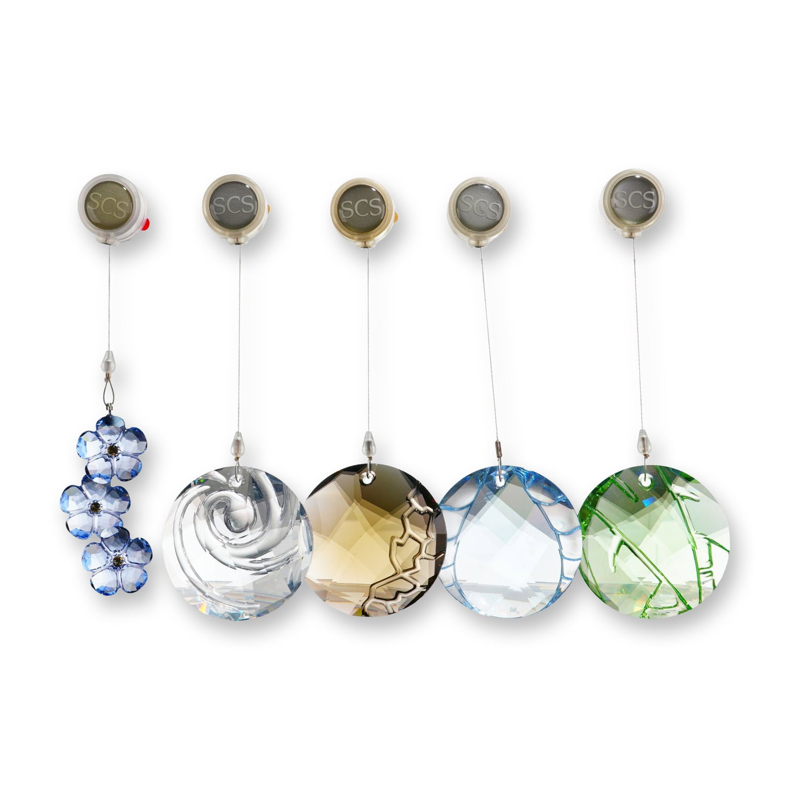 5pc Swarovski SCS Elements Crystal Window Ornaments: Swarovski, Austria. Group of five faceted crystal window ornaments from the Swarovski Crystal Society (SCS) Elements series, circa 2008-2010. The collection includes one vertical ornament composed of 