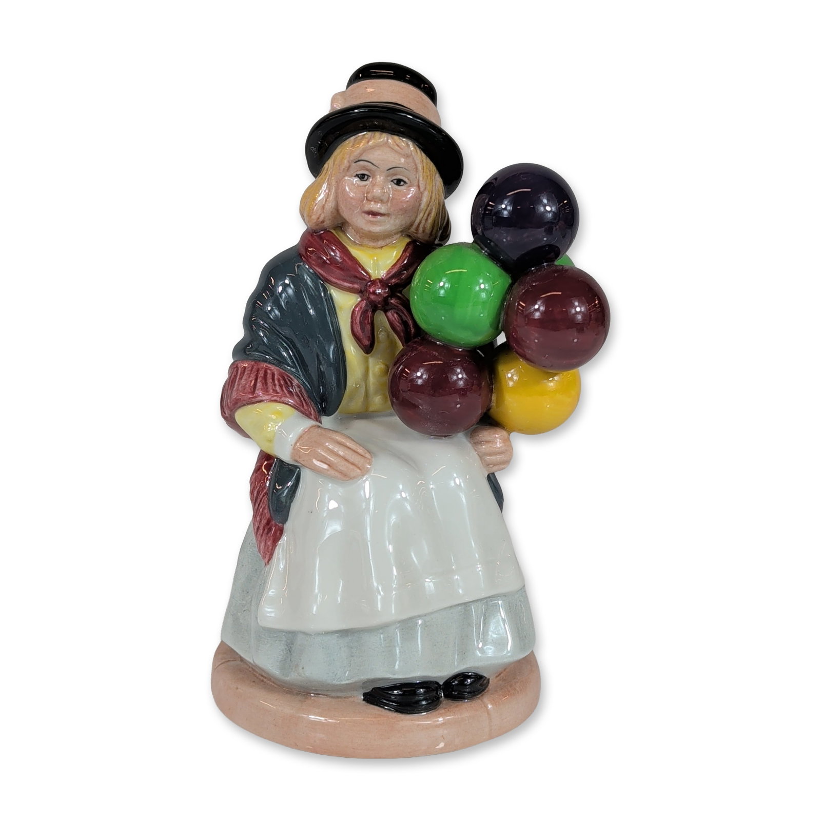 Royal Doulton Balloon Girl Porcelain Figurine HN2818: Royal Doulton porcelain figurine titled Balloon Girl, model number HN 2818, in polychrome glazed porcelain. The figure is depicted seated on a brick-patterned wall wearing a black hat, yellow blouse w