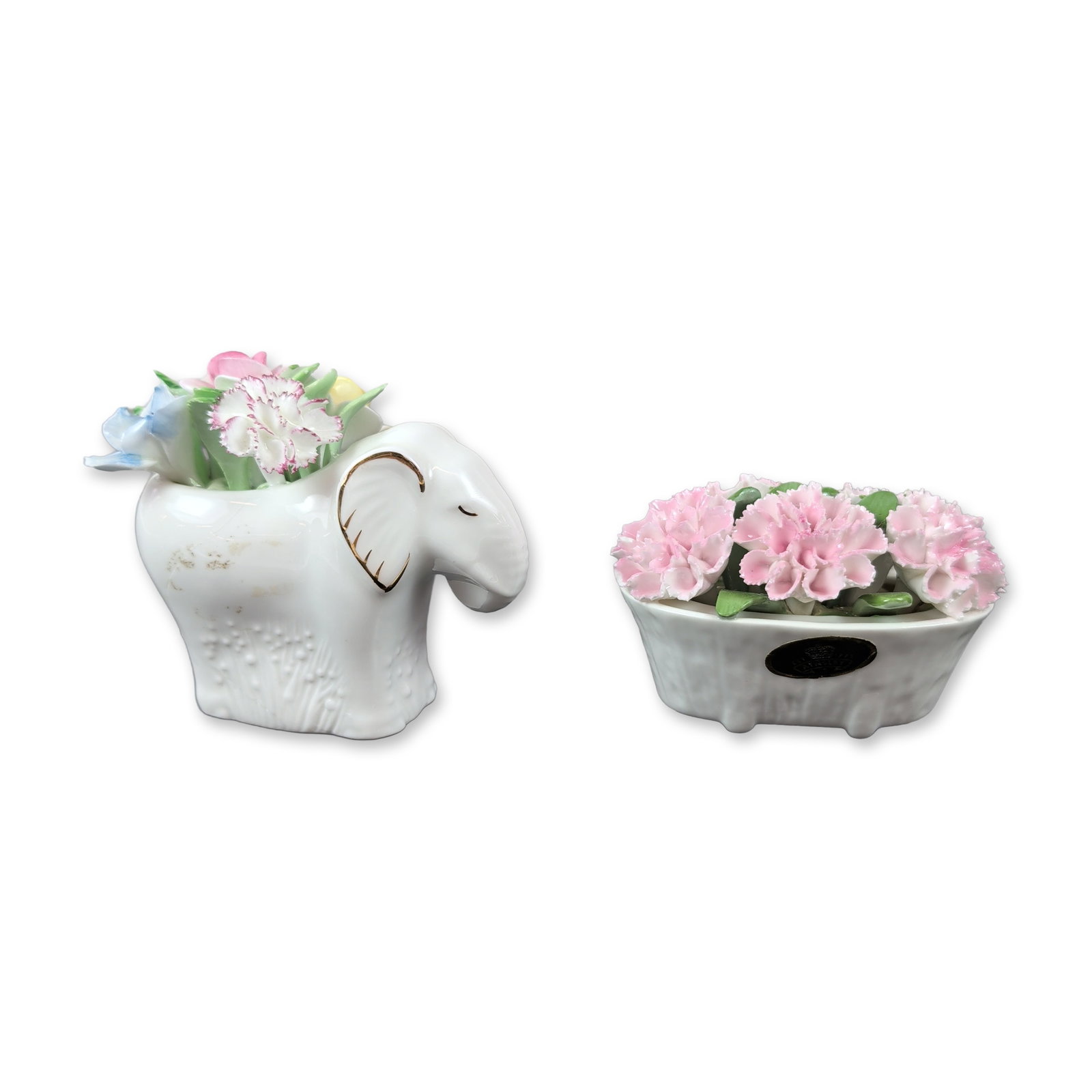 Aynsley Bone China Floral Figurine: Aynsley figurine features a fluted white basket brimming with hand-crafted pink carnations and green foliage, marked on the base with a blue Aynsley England backstamp for August Carnation and still