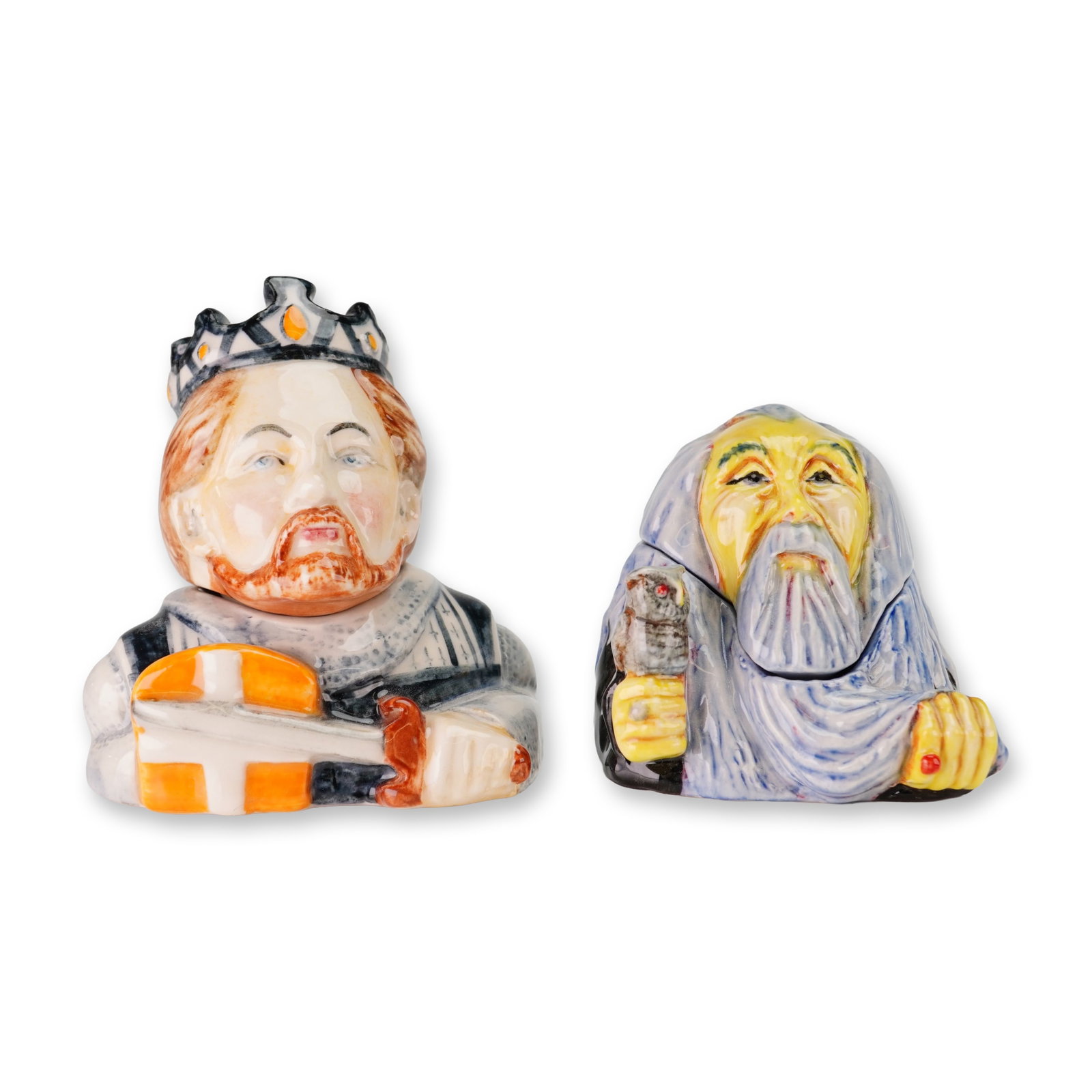 2pc Kevin Francis Prototype Face Pots, Merlin and King Richard the Lionheart: A pair of glazed ceramic Face Pots by Kevin Francis, featuring the characters Merlin and King Richard the Lionheart. Each figure is a two-piece lidded pot. King Richard is depicted with a crown,