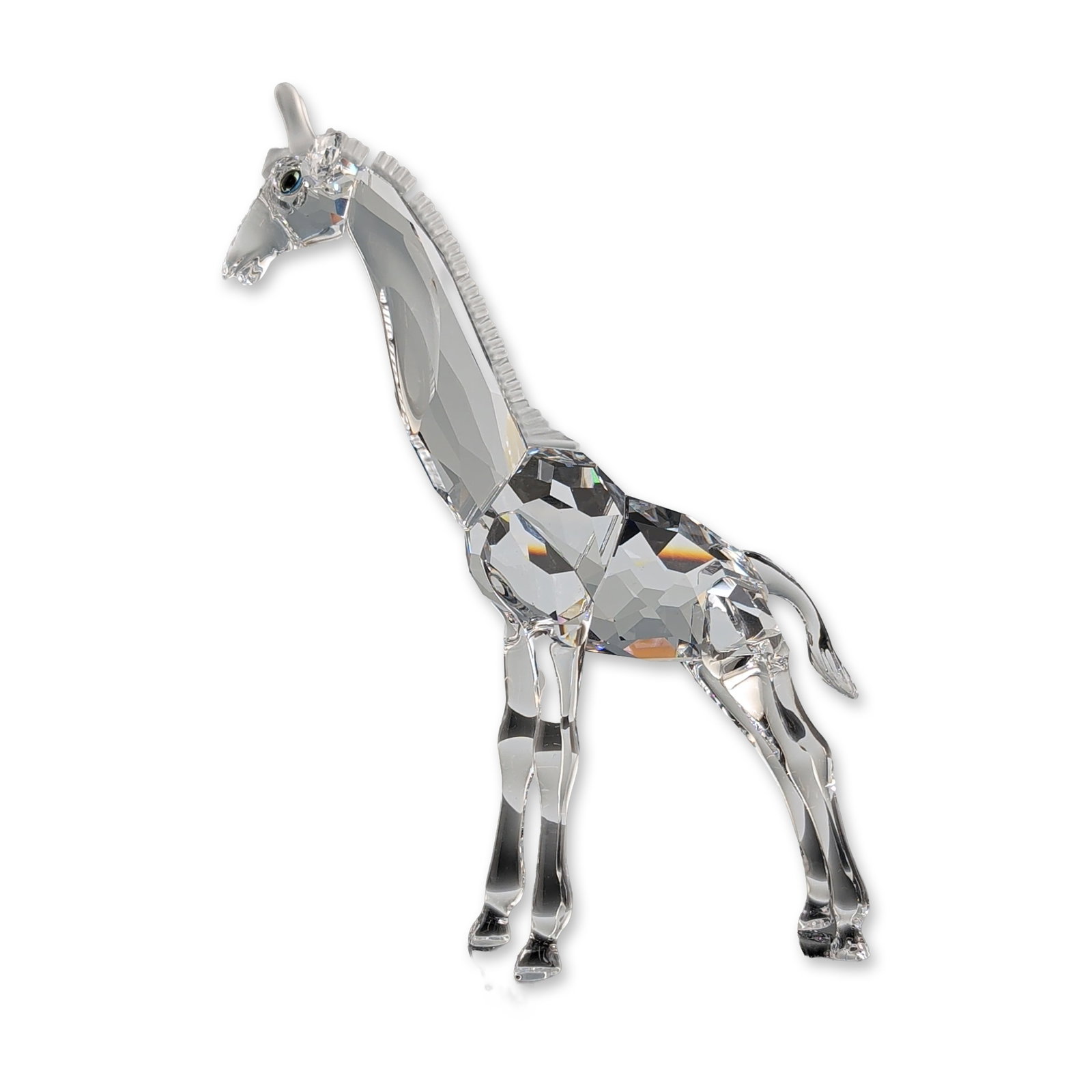 Swarovski Silver Crystal Giraffe Figurine: Swarovski Silver Crystal figurine of a giraffe in faceted lead crystal, featuring a frosted mane. The head is detailed with frosted ossicones and iridescent crystal eyes. Accompanied by the original S