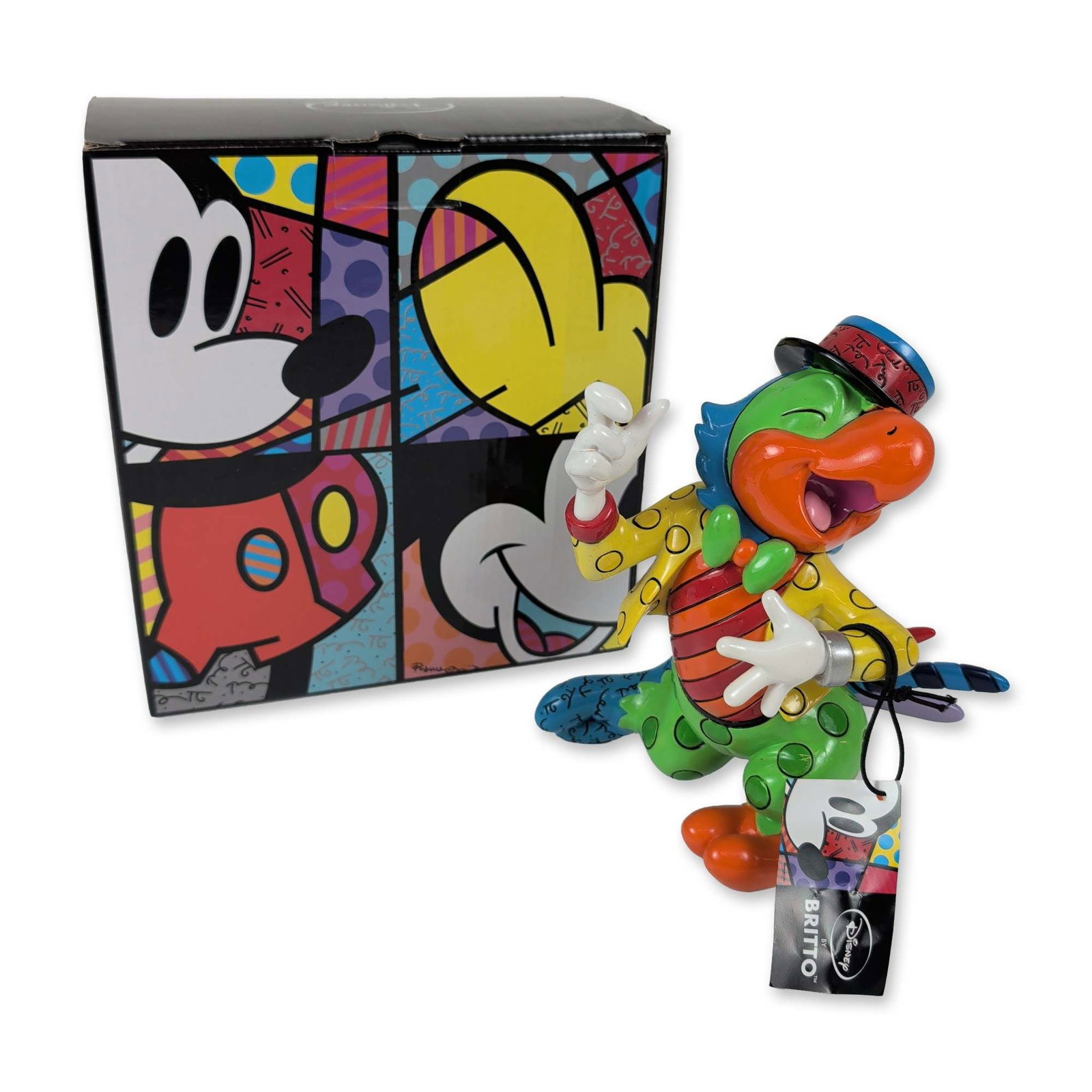 Disney by Britto Jose Carioca Resin Figurine: Enesco Disney by Britto collection. Jose Carioca figurine in stone resin, designed by Romero Britto. The piece features a vibrant neo-pop art aesthetic with bold black outlines and varied geometric pa