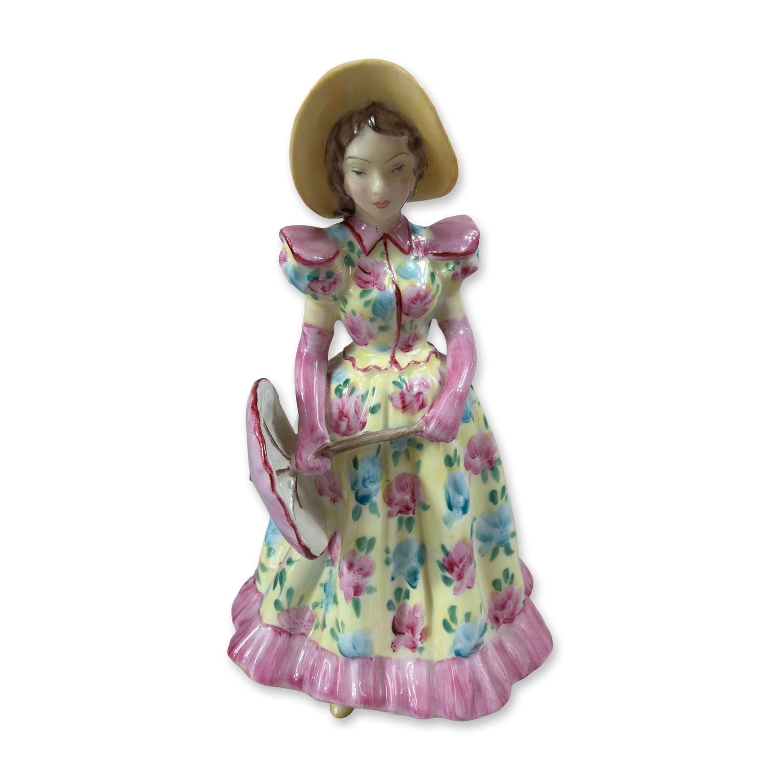 Radnor Bone China Anne Figurine: Radnor Bone China hand-painted porcelain figurine titled Anne. The female figure is depicted standing in a yellow wide-brimmed sunhat with a pink ribbon, wearing a pale yellow dress decorated with pin