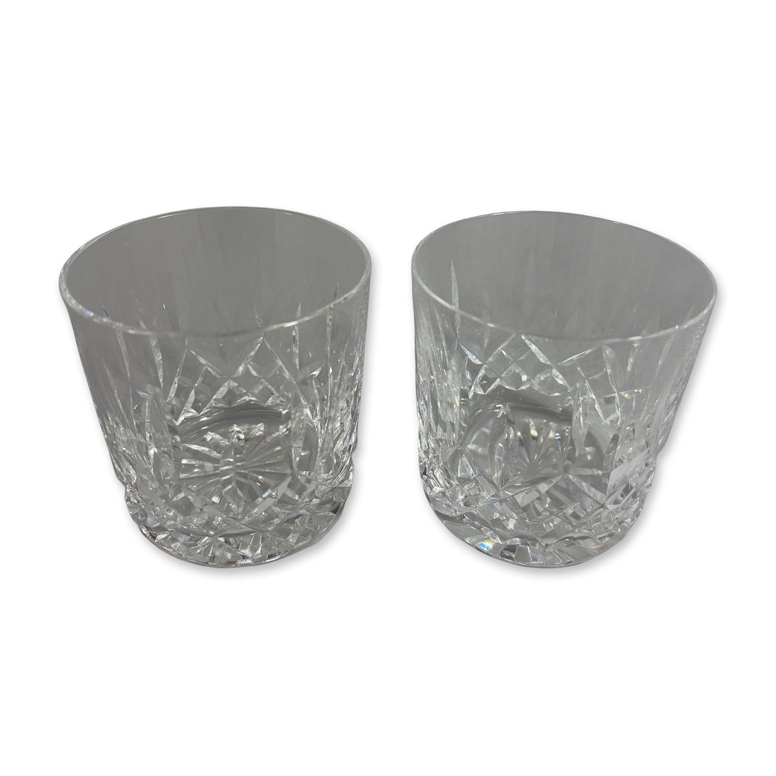 Pair of Waterford Lismore Old Fashioned Tumblers Glasses: Pair of Waterford crystal double old-fashioned glasses. Each tumbler has a cylindrical form decorated with a central band of diamond-point cross-hatching, bordered by deep vertical wedge cuts extendin