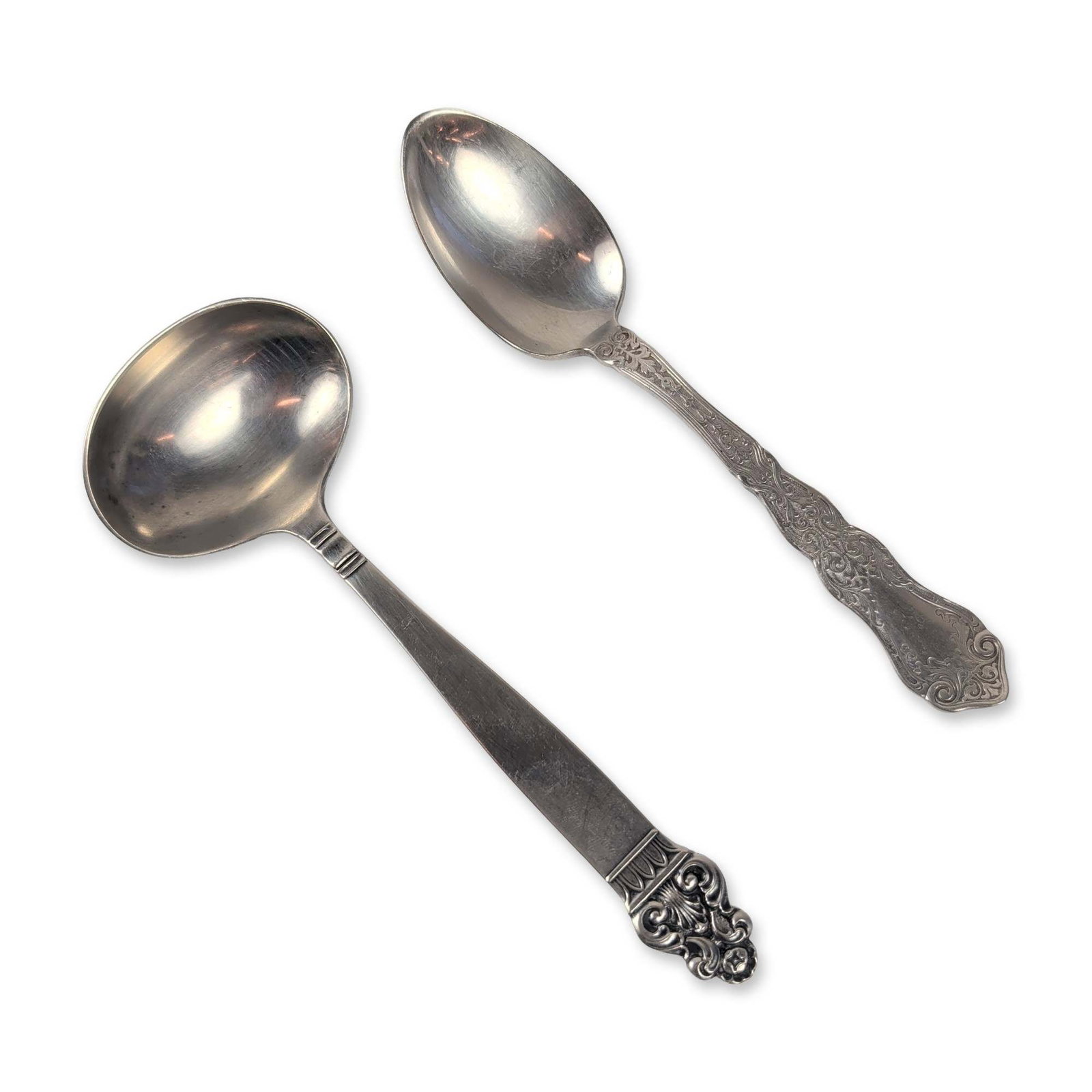 Two Wm. Rogers and Th. Marthinsen Mixed Sterling Silver Spoon and Ladle: Two spoons from different makers: a teaspoon by Wm. Rogers & Son in the King Frederick pattern, with an ornate scroll and floral design on a sterling silver handle, marked WM. ROGERS & SON XII and PAT