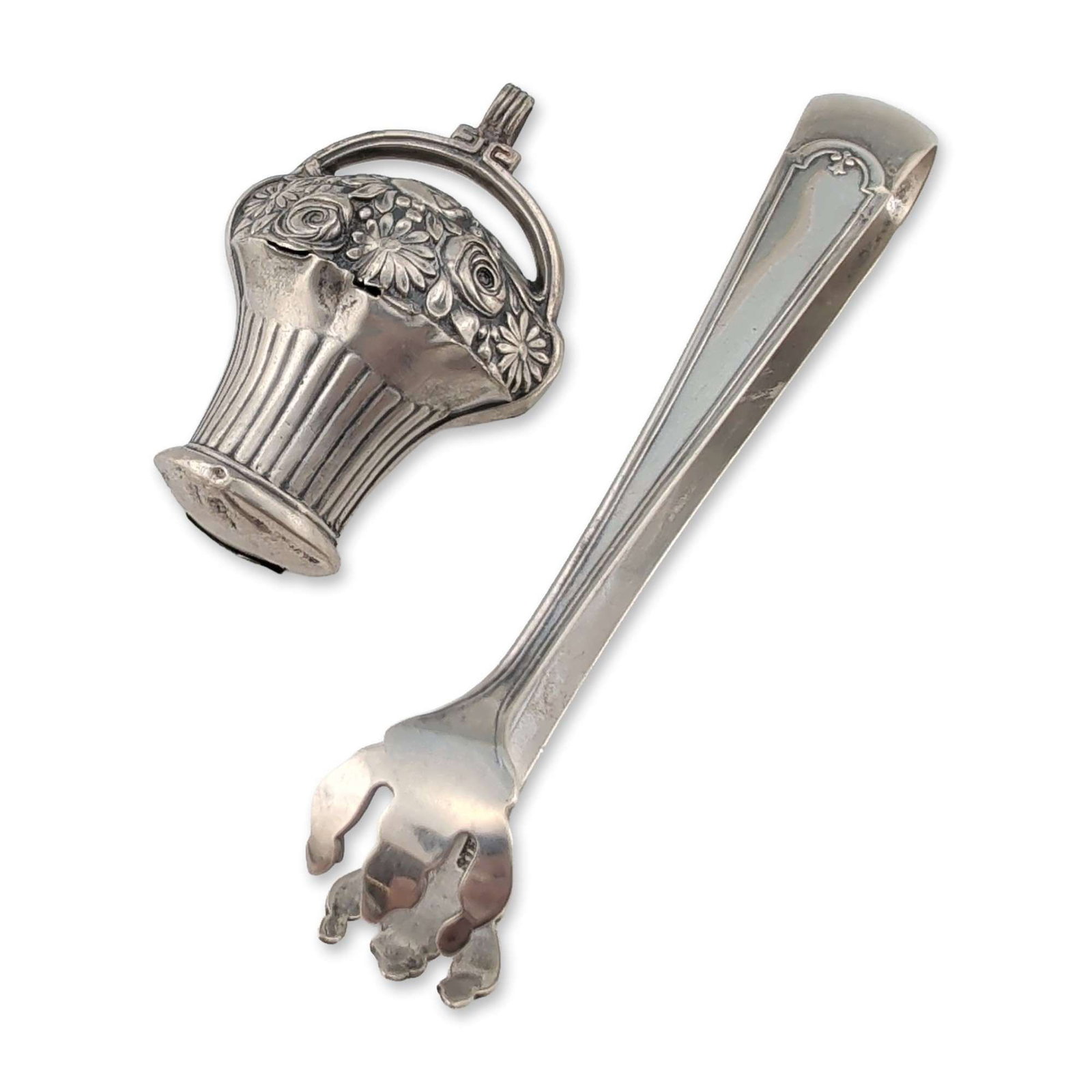 2pc Weidlich Sterling Silver Claw Tongs and Miniature 800 Silver Basket: Weidlich Manufacturing Company. Sterling silver sugar or nut tongs featuring cast bird-of-prey claw grips. The spring handles terminate in detailed talons and include a scrolled detail at the bend. On