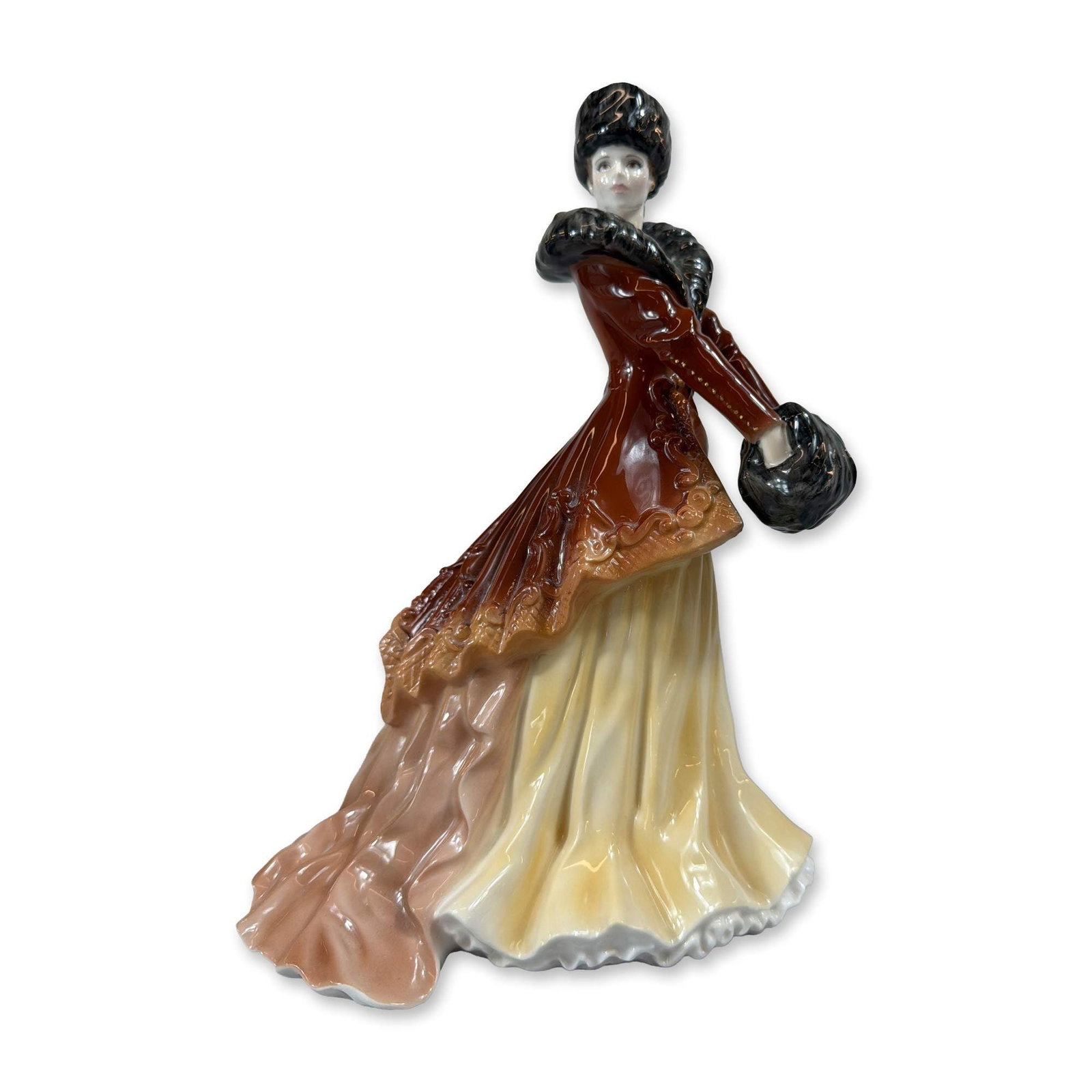 Royal Worcester Natasha Bone China Premiere Figurine: Royal Worcester fine bone china figurine titled Natasha, part of the Premiere Figurine series for 1998. Modeled by Richard Moore in 1997, the figure depicts a lady in late Victorian style winter attir