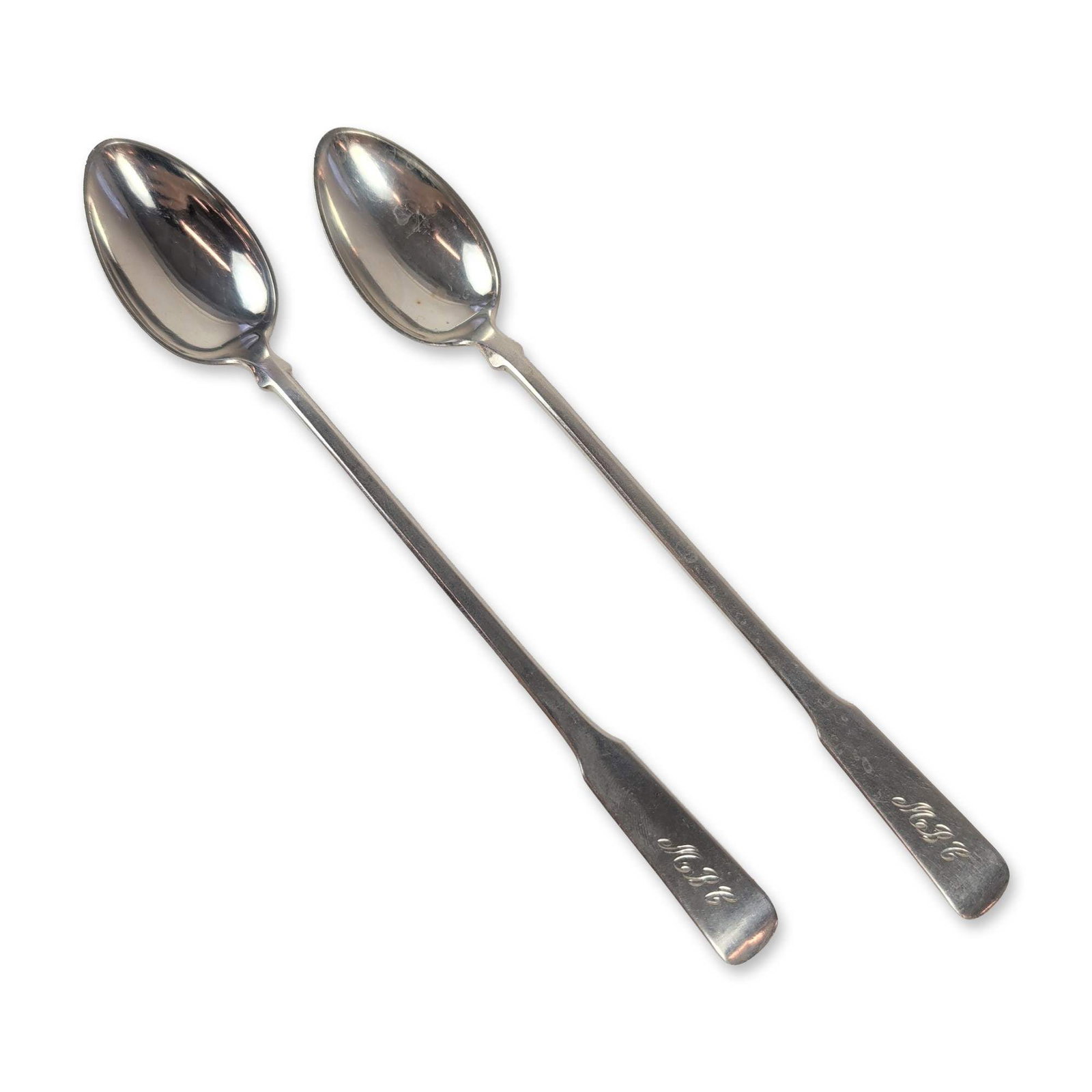 Pair of Watson Company Sterling Silver Iced Teaspoons: Watson Company (Attleboro, Massachusetts). Pair of long-handled iced teaspoons in sterling silver, featuring an elongated fiddle-style pattern with flared spatulate terminals. Each handle is engraved 