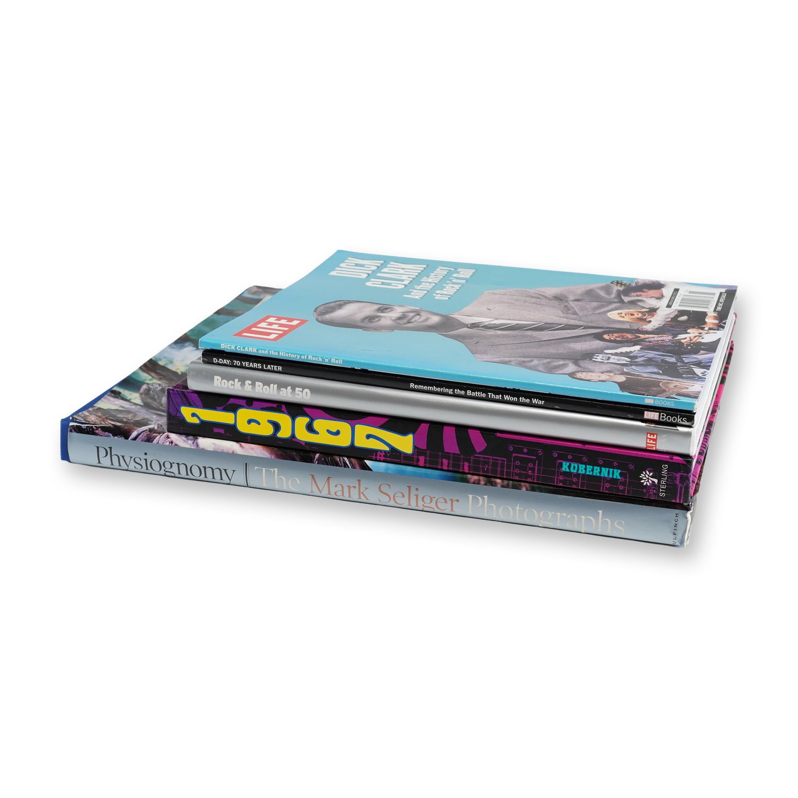 Assortment of Five Music and History Hardcover and Softcover Books and Magazines: This collection features five publications centered on music history, celebrity photography, and twentieth-century historical events. The cornerstone of the lot is Physiognomy: The Mark Seliger Photog