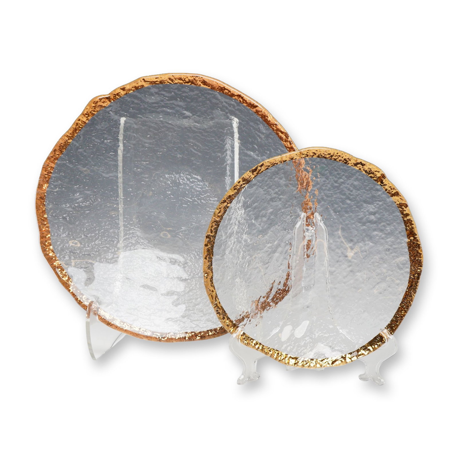 Two Textured Glass Centerpiece Bowls with Gilt Rims: Contemporary style centerpiece bowls in kiln-formed textured icy glass with gold rims, featuring organic, irregular perimeters and a heavy hammered texture to the underside. Each piece is finished wit