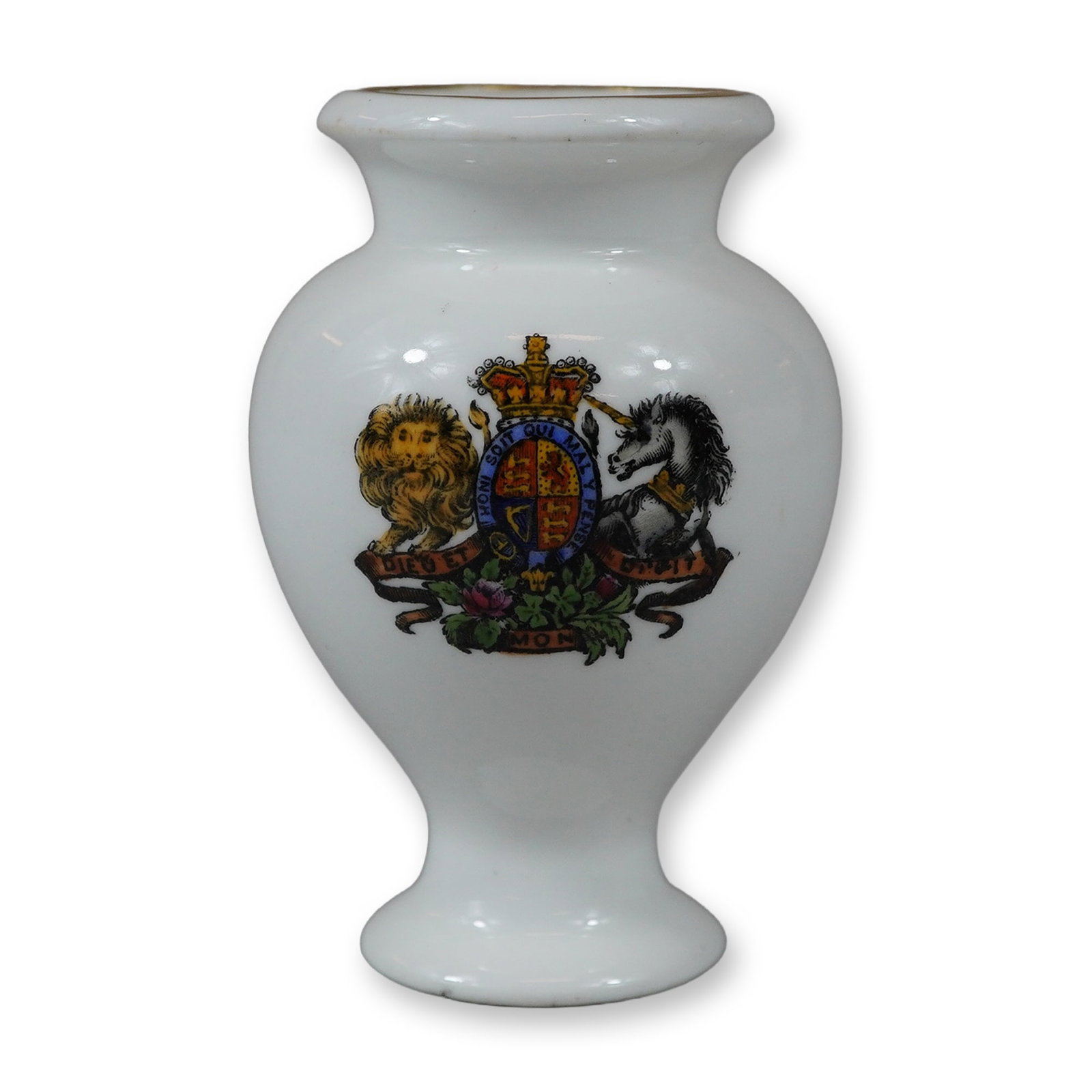 Wedgwood Miniature Porcelain Vase with British Royal Coat of Arms: This miniature porcelain vase in a baluster form was produced by Wedgwood in England. The exterior is decorated with a transfer-printed British Royal Coat of Arms, featuring a lion and unicorn flankin