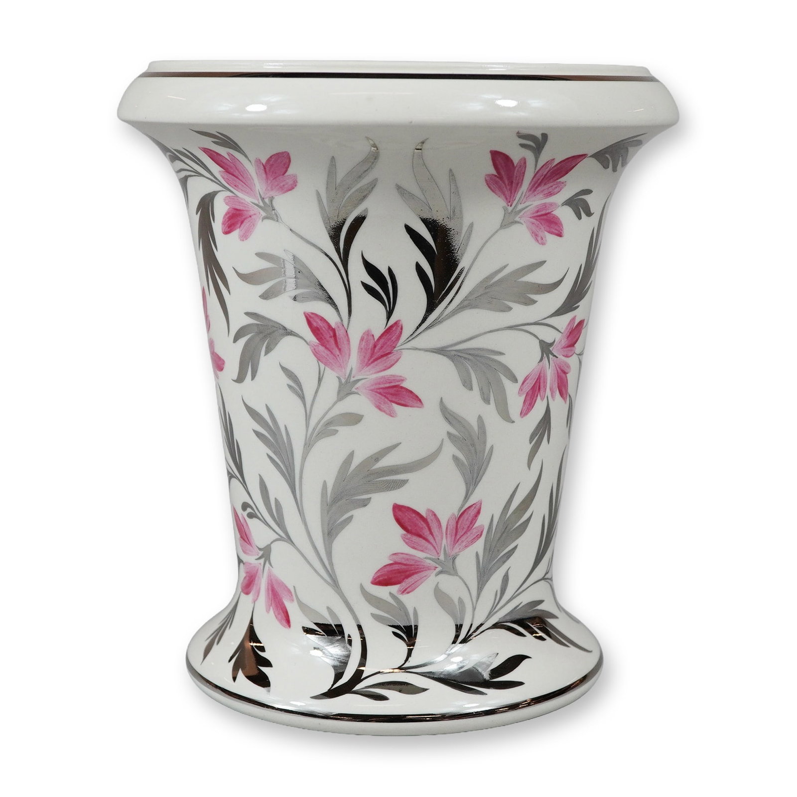Wedgwood Silver Luster and Pink Floral Flared Vase: The vessel features a trumpet form with a waisted center, a wide stepped rim, and a stepped base. The exterior is decorated with a floral pattern consisting of pink multi-petal flowers amidst silvery 