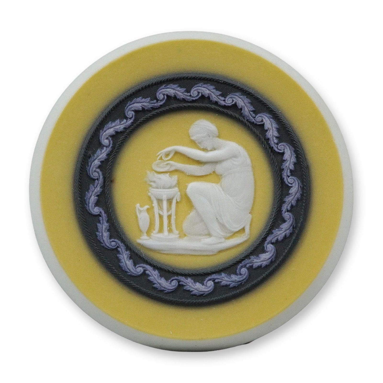 Wedgwood Tri-Color Jasperware Medallion Featuring Sacrifice Scene: This is a circular tri-color jasperware medallion manufactured by Wedgwood. The piece consists of a yellow jasper dip body with an applied black border. The decoration features sprigged bas-relief