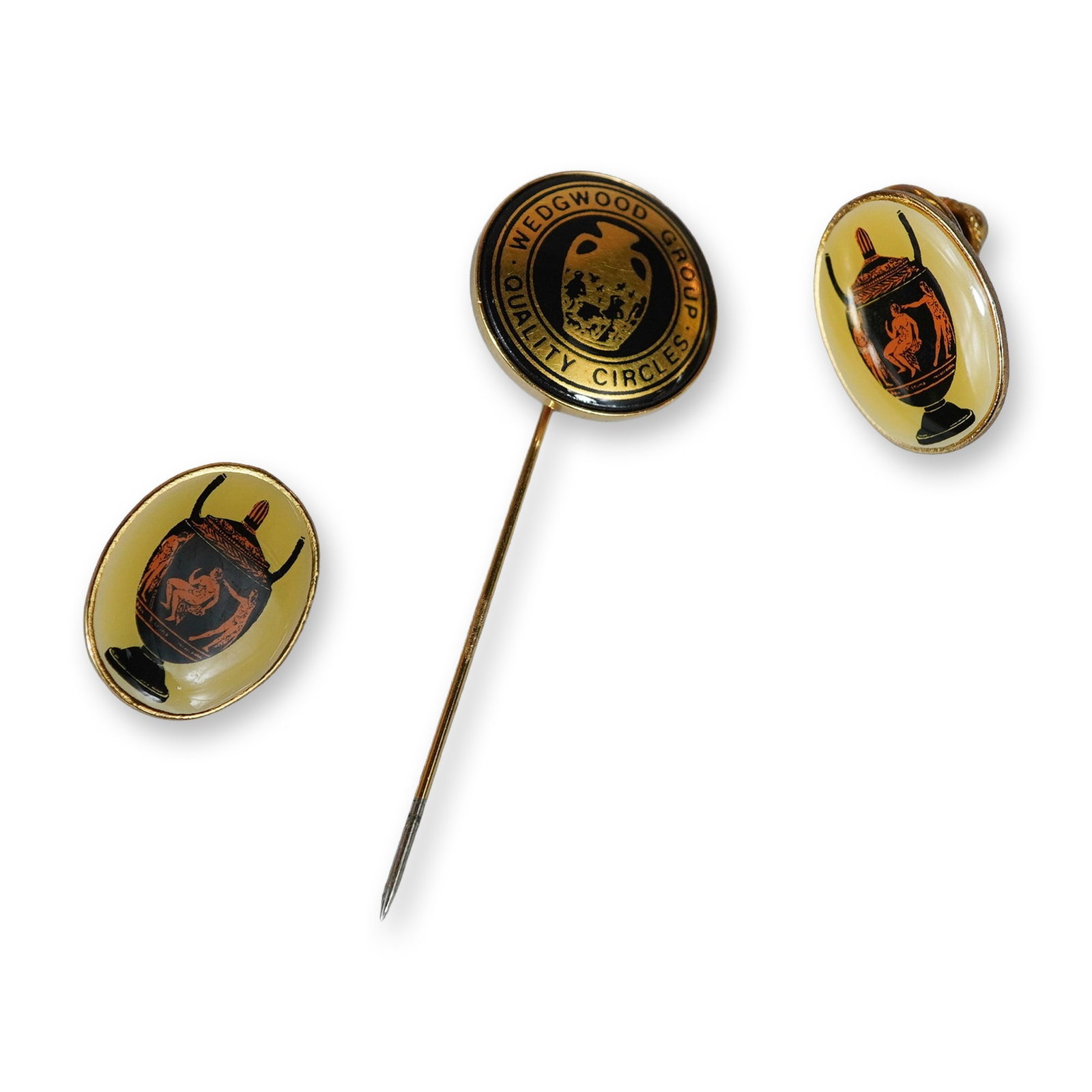 3pc Wedgwood International Seminar Commemorative Pins: This three piece collection of commemorative jewelry includes one circular stickpin and two matching oval lapel pins related to the Wedgwood Group and the Wedgwood International Seminar (W.I.S.). The 