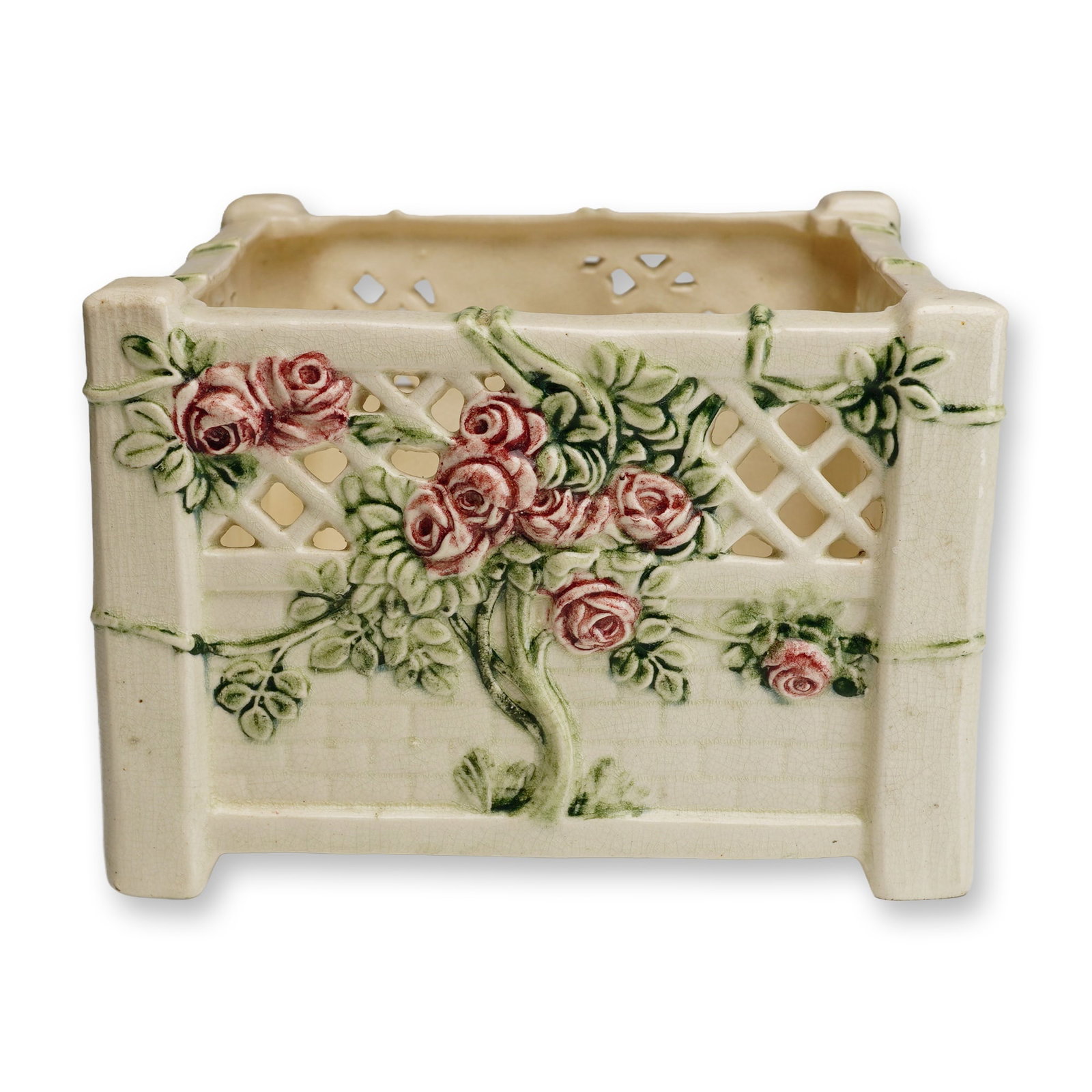 Weller Pottery Square Reticulated Planter, Roma: A square ceramic planter or cachepot produced by Weller Pottery of Zanesville, Ohio, in the Roma pattern, introduced circa 1914. This piece is crafted from a cream-colored earthenware body and feature