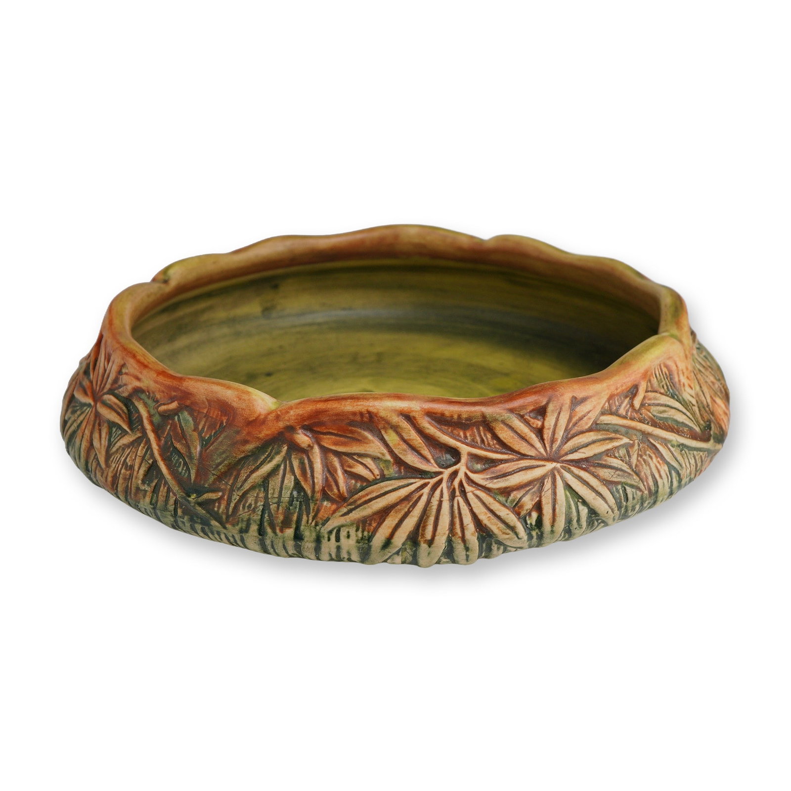 Weller Pottery Console Bowl, Marvo: Created in the 1920s with deep relief foliage designed texture of fronds and leaves. Color palette in brown, green and burnt orange. Dimensions: 9.50"L x 8.00"W x 2.75"H Weight: 3.20 lb