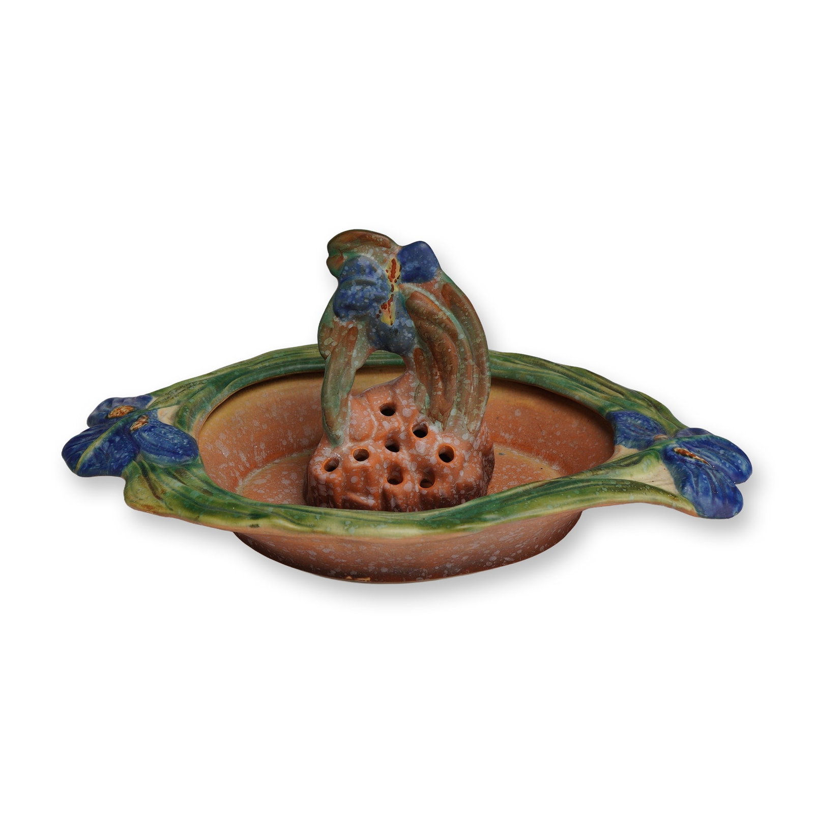 2pc Weller Pottery Ardsley Iris Console Bowl and Flower Frog: The Ardsley line, produced by Weller Pottery in the 1930s, is one of the company's most graceful, molded patterns. The two-piece set is decorated with purple iris blossoms and green fronds over a