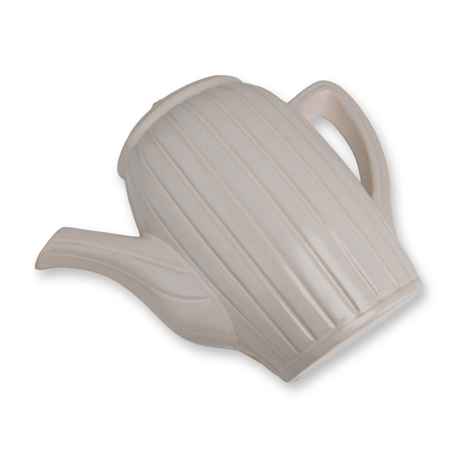 Rare Weller Pottery Novelty Wall Pocket, Teapot: A cream-colored glazed ceramic wall pocket designed in the form of an Art Deco-style teapot. The piece features a vertically ribbed body with an integrated handle and spout. The reverse is flat with