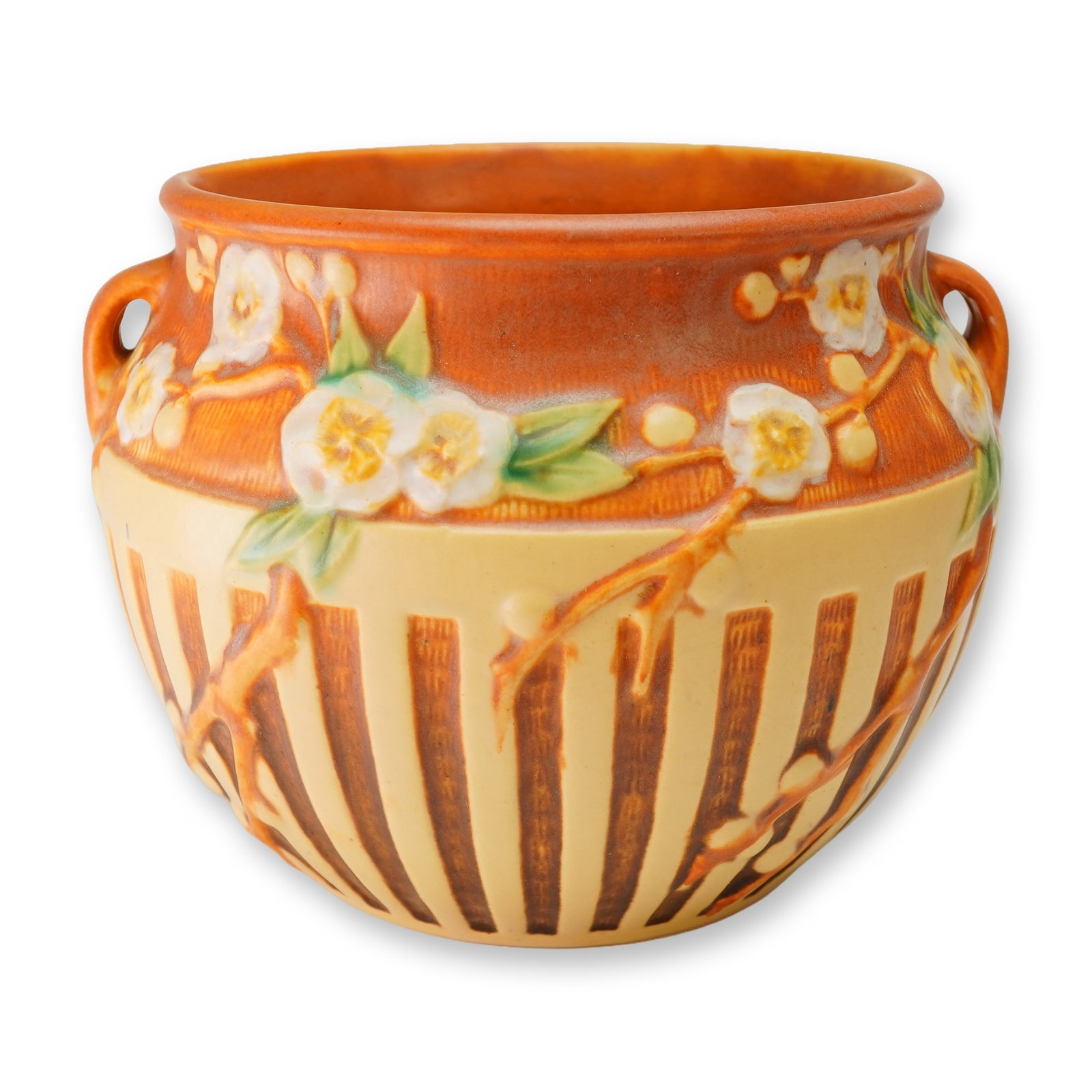 Roseville Pottery Brown Jardiniere, Cherry Blossom: The Cherry Blossom pattern introduced circa 1933. The ceramic vessel features a bulbous form with two small integral lug handles near the rim. The exterior is decorated with a relief floral motif