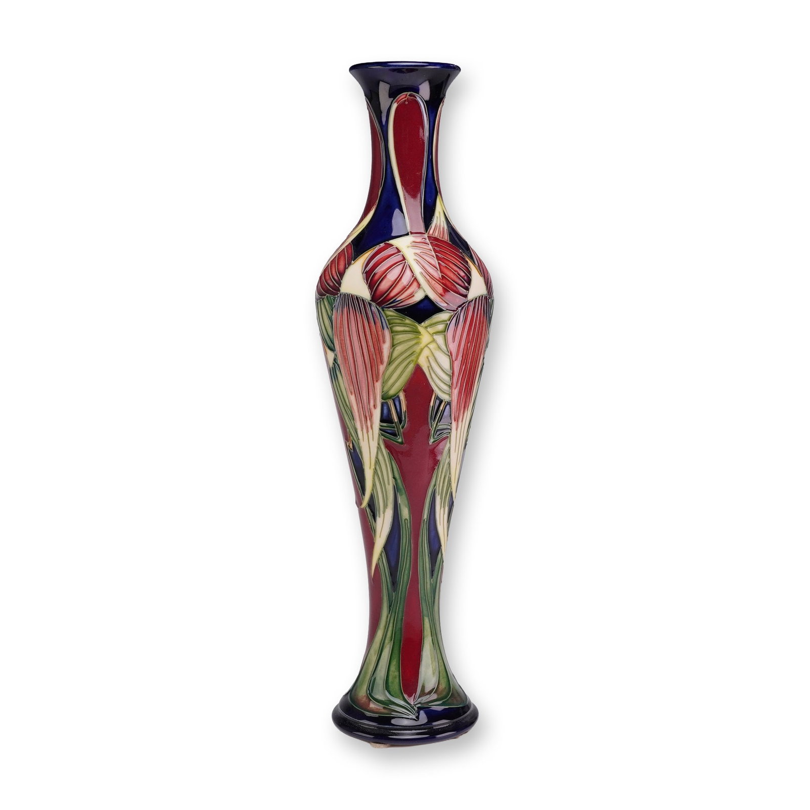 Moorcroft Pottery by Philip Gibson Vase, Trinity Pattern: A tall earthenware pottery vase produced by Moorcroft in the Trinity pattern, designed by Philip Gibson. The vessel features an elongated, slender form with a bulbous center, a flared rim, and a circu