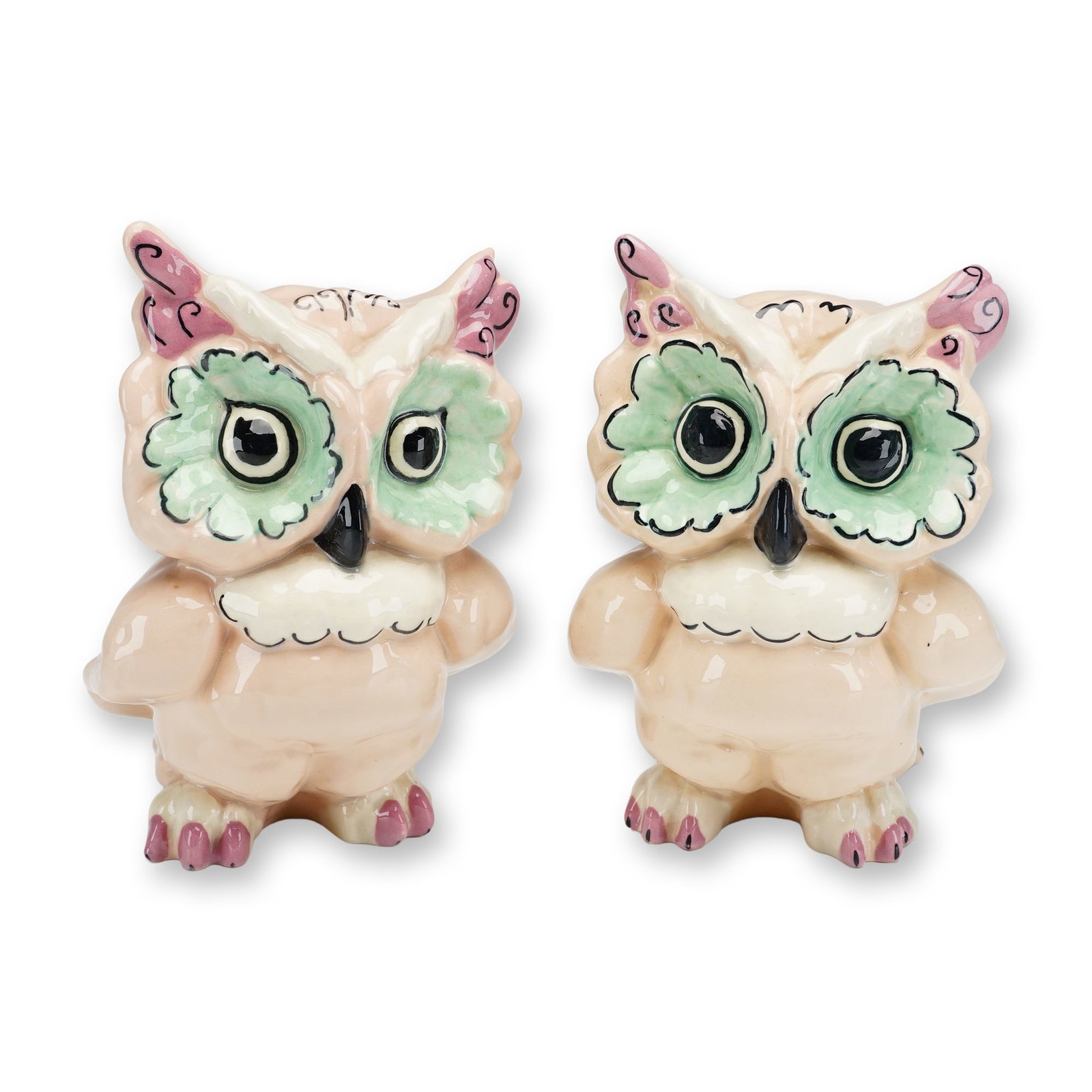 Two Kay Finch California Pottery Figurines, Hoot Owl: Each hollow-cast piece is finished in a pale pink high-gloss glaze with hand-painted accents. The decorative scheme includes green-ringed eyes, pink-tufted ears, and purple-toned claws and tail feathe