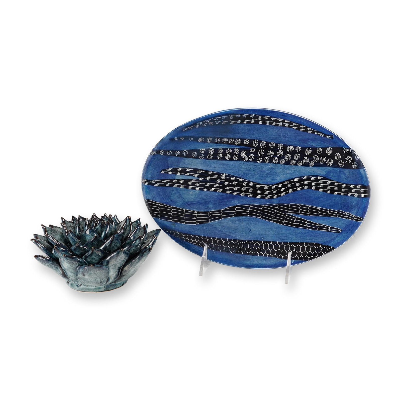 2pc Decorative Pieces Including a Soapstone Tray and a Ceramic Succulent Sculpture: This lot consists of two contemporary decorative objects: a large tray and a wall-mounted sculpture. The first item is a shallow, ovoid soapstone tray featuring a vibrant cobalt blue ground. The inter