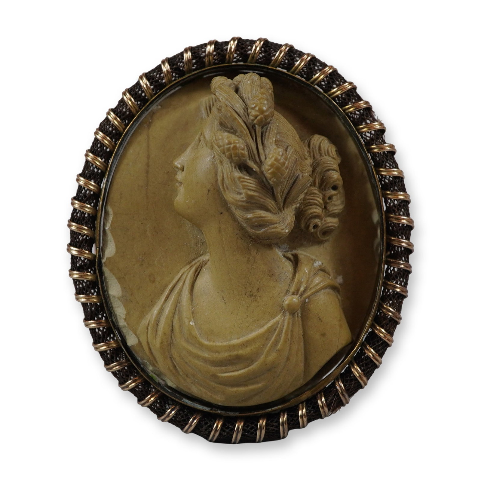 10K Gold Isabel Peltman Borrow's Italian Carved Lava Cameo Brooch: This Italian carved lava cameo brooch, dating to approximately 1900, features a high-relief profile bust of a classical female figure, potentially a Bacchante, with an elaborate coiffure accented by g