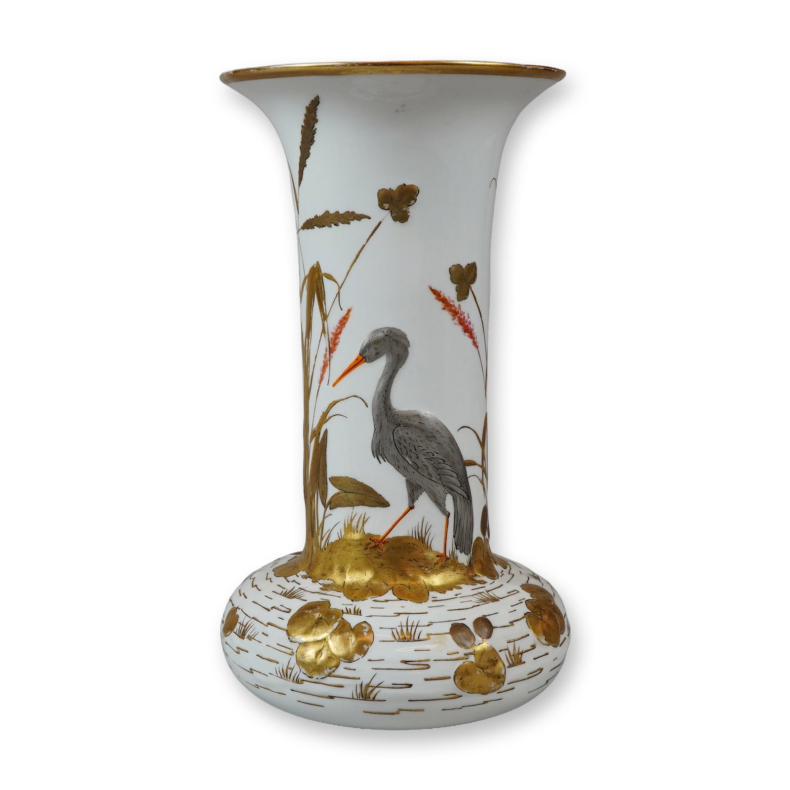 Wedgwood by Joseph-Theodore Deck Gilt and Silvery Japonisme Style Crane Vase: The form features a tall, flaring neck rising from a squat, bulbous base. The decoration consists of hand-painted and raised gilt motifs. The primary face depicts a silvery-grey crane standing amidst 