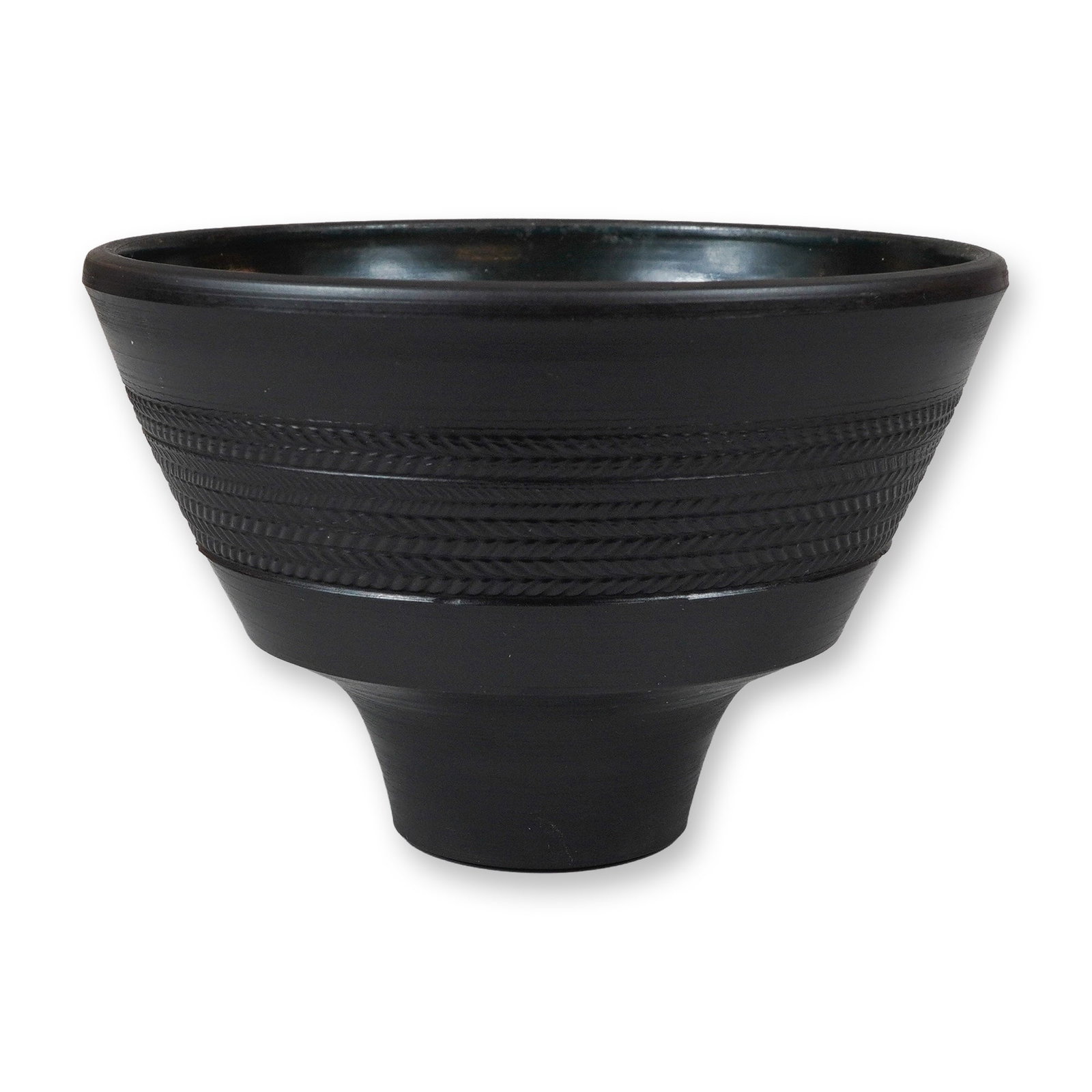Wedgwood David Puxley Black Basalt Studio Pottery Bowl: A Wedgwood black basalt studio pottery bowl designed by David Puxley. The vessel features a flared, conical form resting on a narrow, integrated foot. The exterior is finished in an unglazed, matte bl