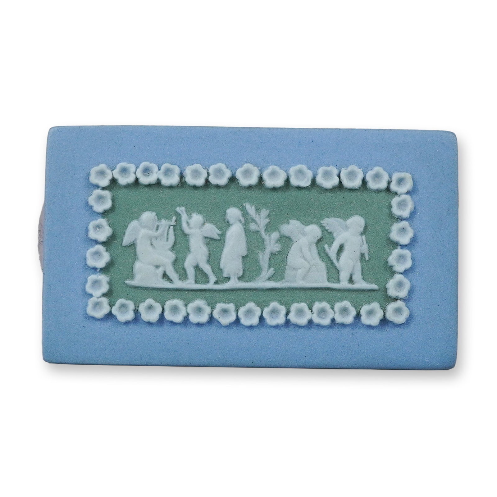 Wedgwood Tricolor Jasperware Medallion: A Wedgwood tricolor jasperware rectangular medallion. This piece is constructed from light blue stoneware with a central sage green rectangular inset panel. The panel features white sprigged bas-relie