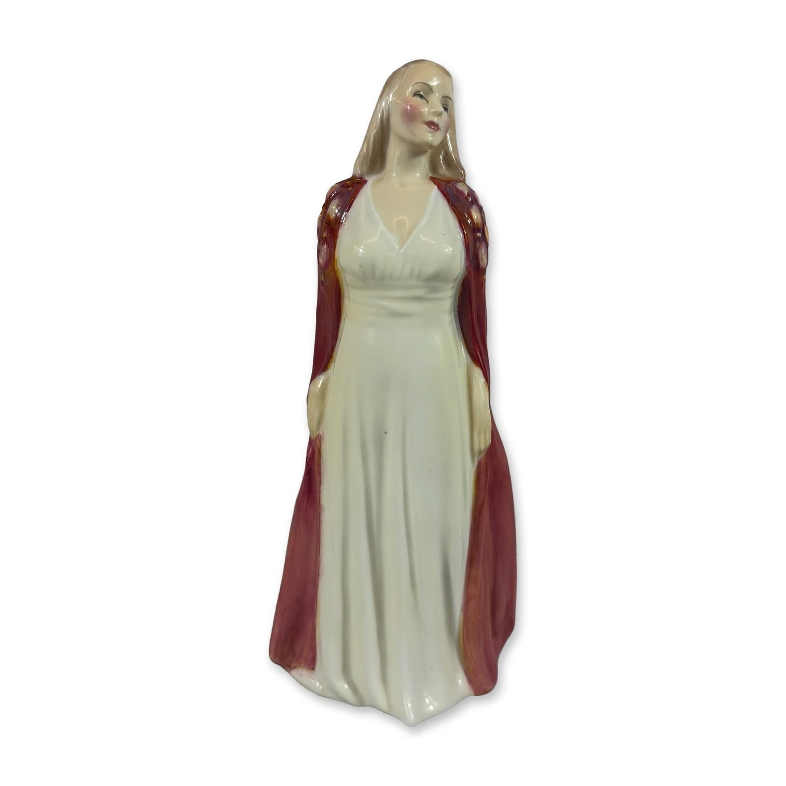 Royal Doulton Collinette Porcelain Figurine HN 1999: Royal Doulton porcelain figurine titled Collinette, model number HN 1999, designed by Leslie Harradine. The figure depicts a standing woman with blonde hair wearing a cream-colored high-waisted gown u