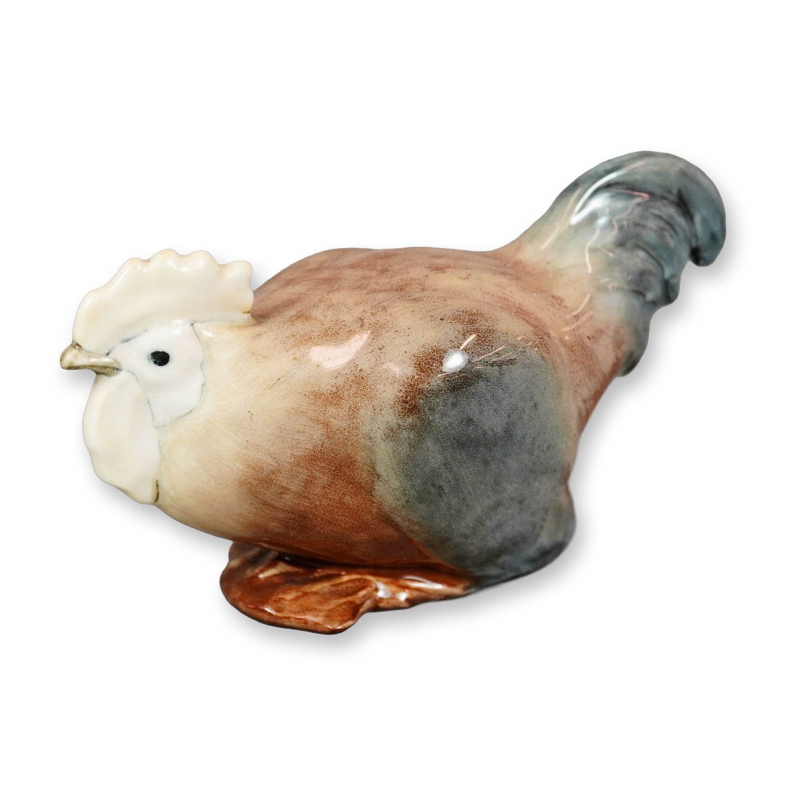 Royal Doulton Porcelain Bird Figurine, Cockerel Crouch HN267: Hand-painted figurine of a resting chicken in shades of brown, blue, and black. Features a Royal Doulton backstamp. Dimensions: 5.75"L x 2.5"W x 3"H Manufacturer or Brand: Royal Doulton Country of Ori