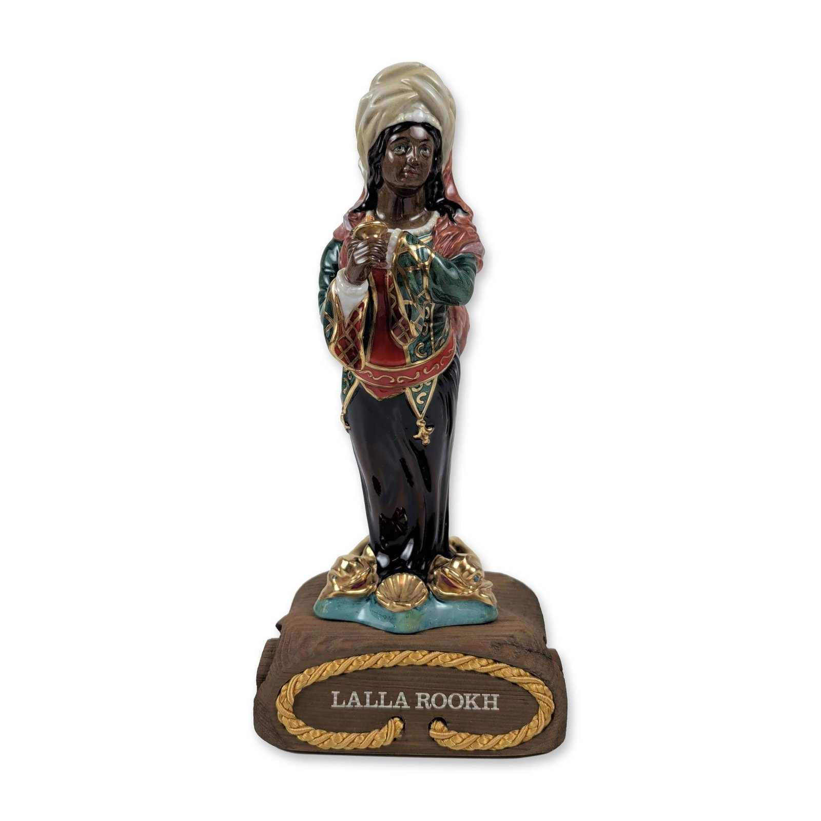 Royal Doulton Lalla Rookh Ships Figurehead Figurine with HN2910: Royal Doulton, England, 1980. Glazed porcelain figurine from the Ships Figureheads series titled Lalla Rookh, modeled after the figurehead of the China Tea Clipper (active 1856-1873). The figure depic