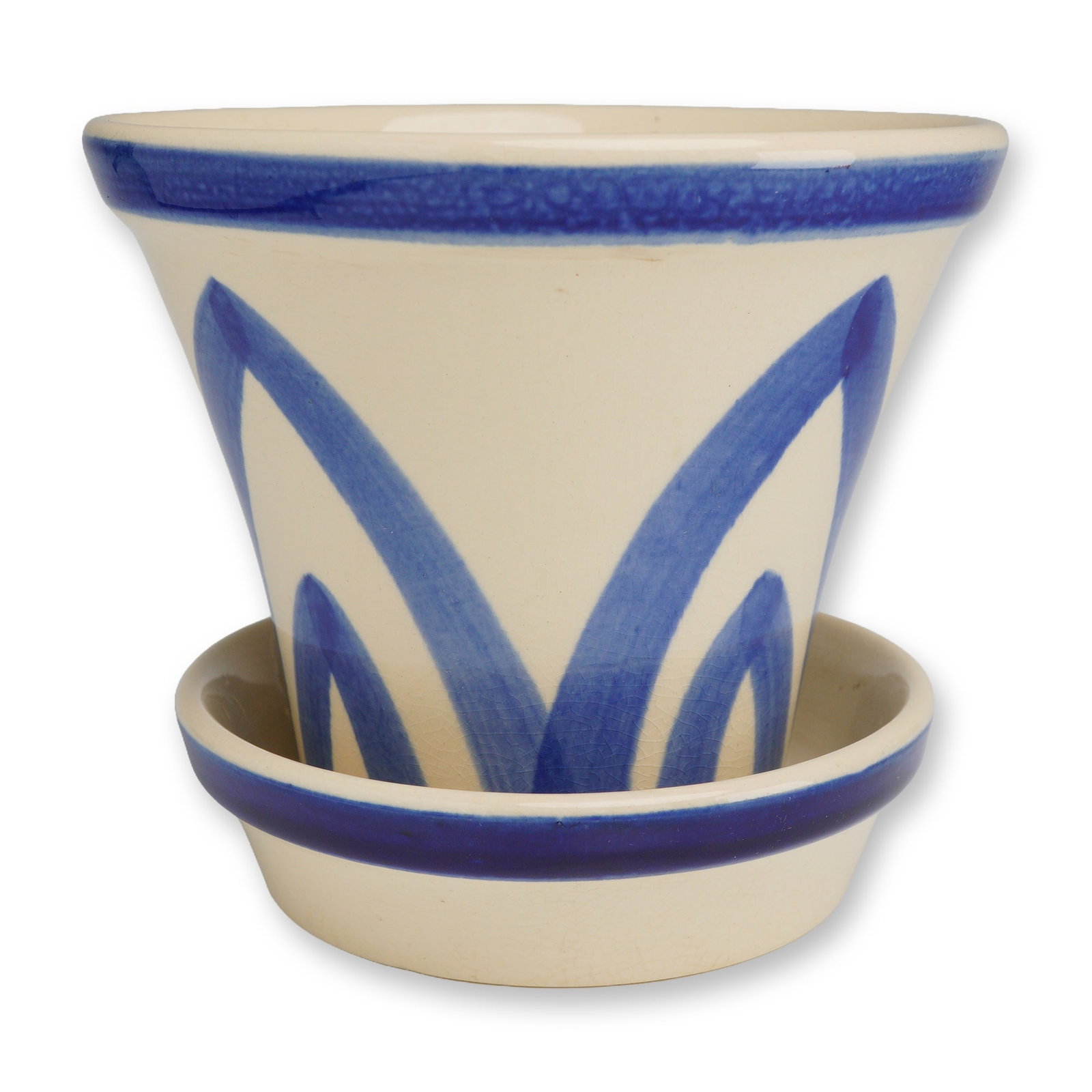 Weller Pottery Art Deco Flowerpot and Saucer: This two-piece set was manufactured by Weller Pottery of Zanesville, Ohio. The flowerpot and matching saucer are crafted from glazed earthenware. The pot features a tapered, conical body with a flared