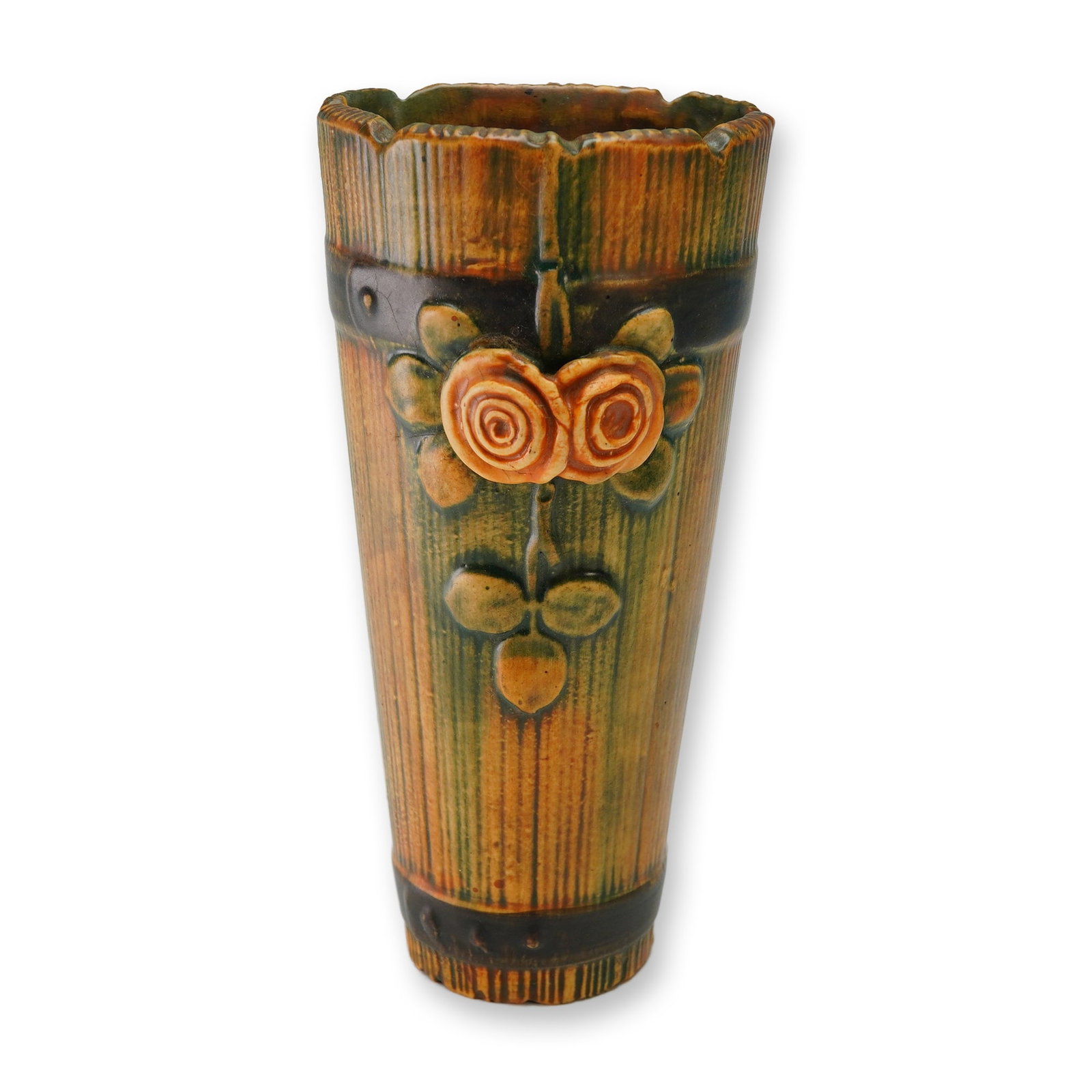 Weller Pottery Ceramic Wall Pocket, Woodrose: This tapered vessel features a vertically ribbed texture and a scalloped upper rim. The front is decorated with a raised relief depicting two stylized ochre-colored roses set against green leaves and 