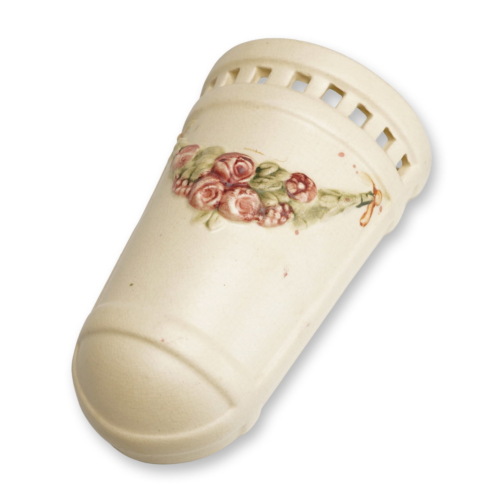 Weller Pottery Creamware Wall Pocket, Roma: This piece is constructed from cream-colored earthenware and features a tapered, semi-ovoid form with a flat reverse and an integrated circular suspension hole. The design is characterized by a pierce
