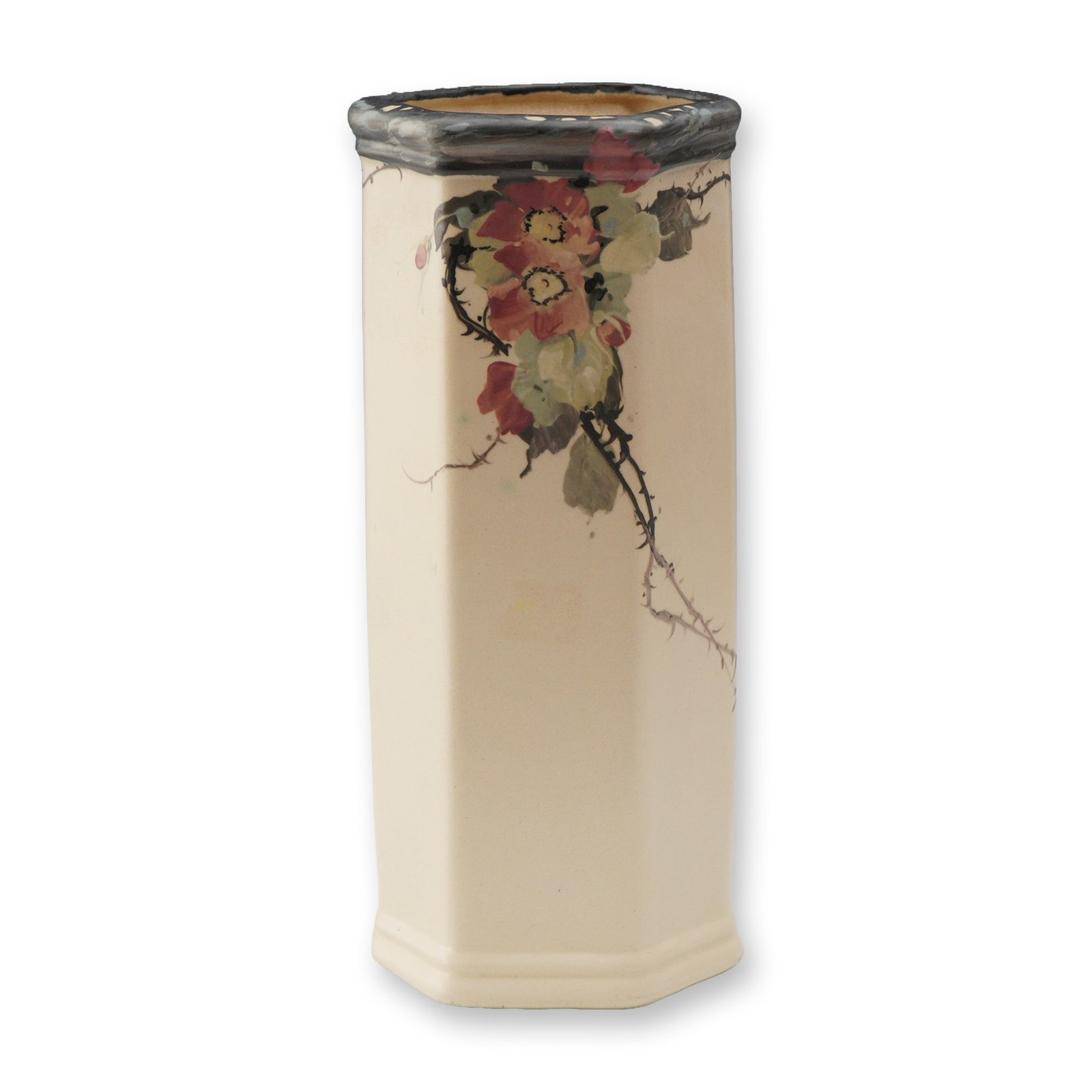 Weller Pottery Hudson Floral Hand-Painted Hexagonal Vase: A fine Weller Pottery Hudson vase with a hexagonal form and hand-painted floral decoration. The design features naturalistic blossoms in shades of red, yellow, and soft green, trailing across the ivor