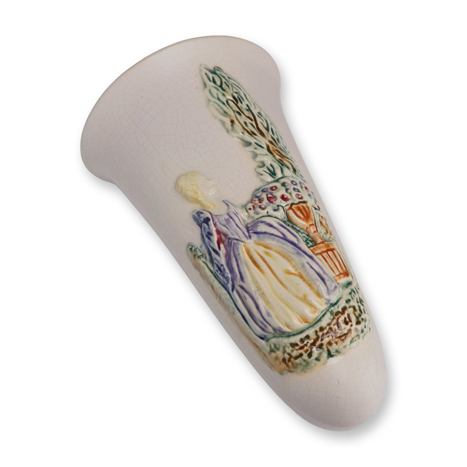 Weller Pottery Woman in the Garden Wall Pocket, Colonial: This piece features a tapered form with a flat reverse and a single circular aperture for hanging. The front is decorated with a raised relief scene depicting a woman in a wide-skirted purple and yell