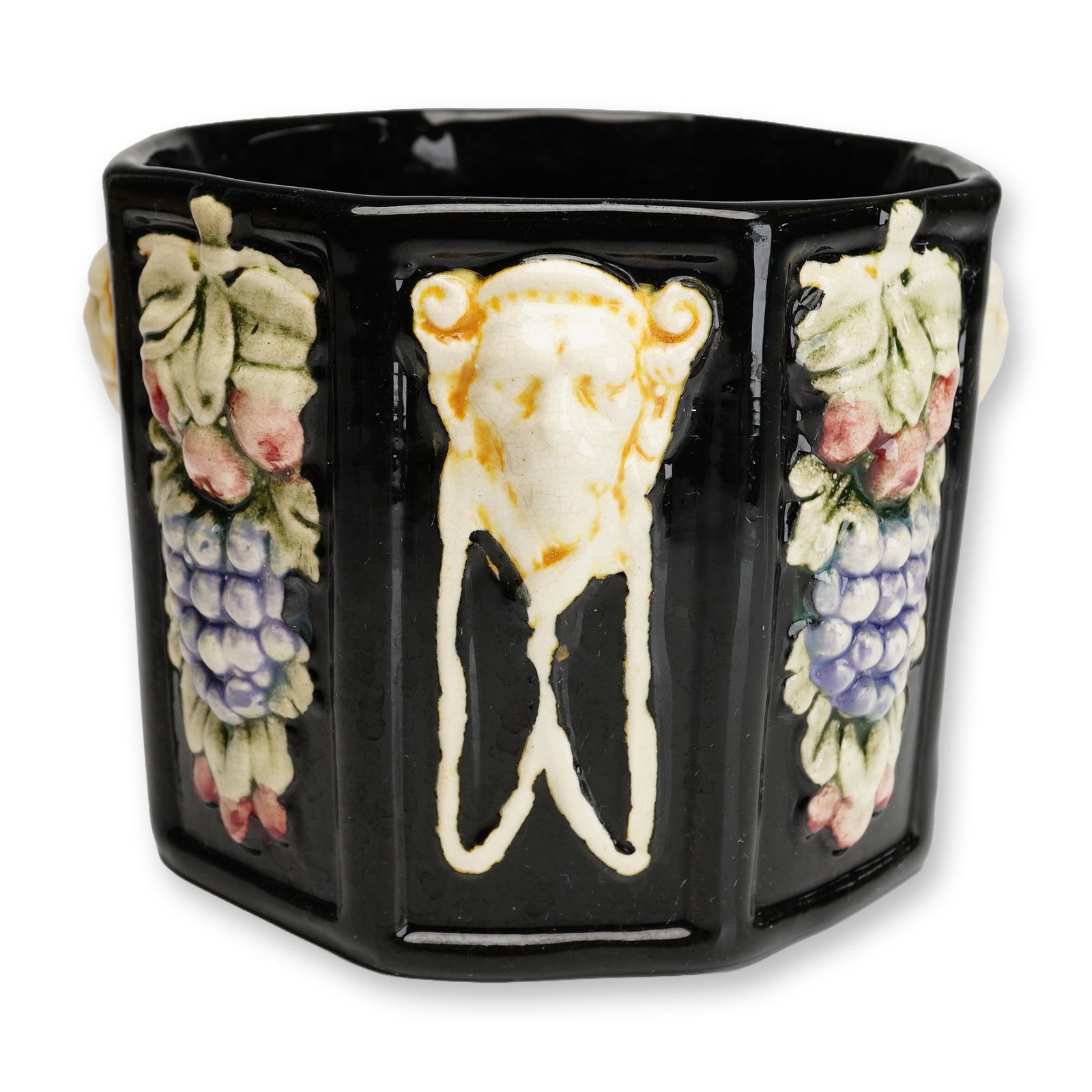 Weller Pottery Zona Octagonal Black Glaze Planter: An early 20th-century American art pottery vessel produced by Weller Pottery as part of the Zona line, circa 1914-1920s. This octagonal ceramic cachepot or planter features a striking glossy black gla