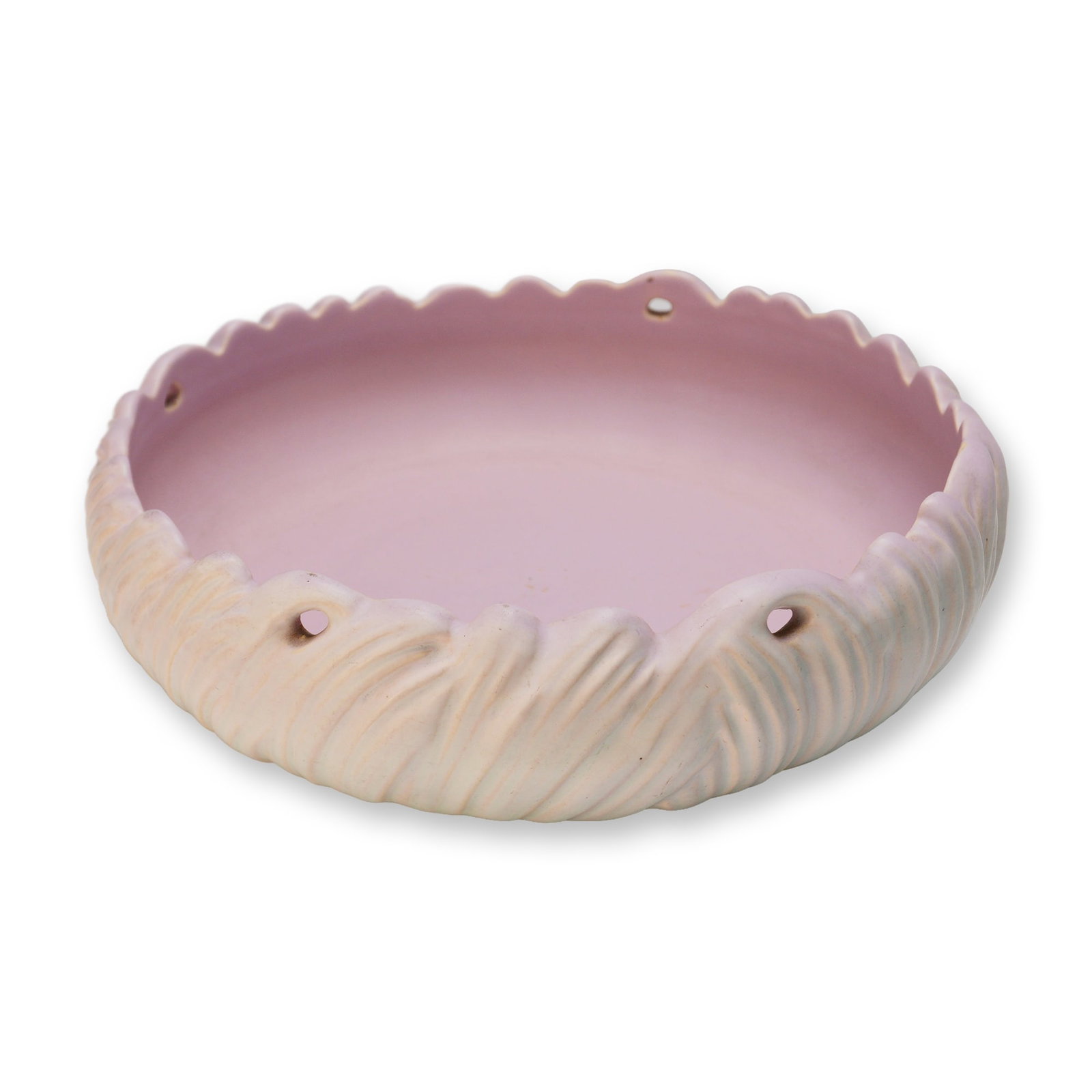 Weller Pottery Hobart Pink Bowl: A vintage Weller Pottery Hobart bowl finished in a soft pink matte glaze with subtle iridescent highlights. The form features a scalloped rim and swirling relief design around the body, showcasing the