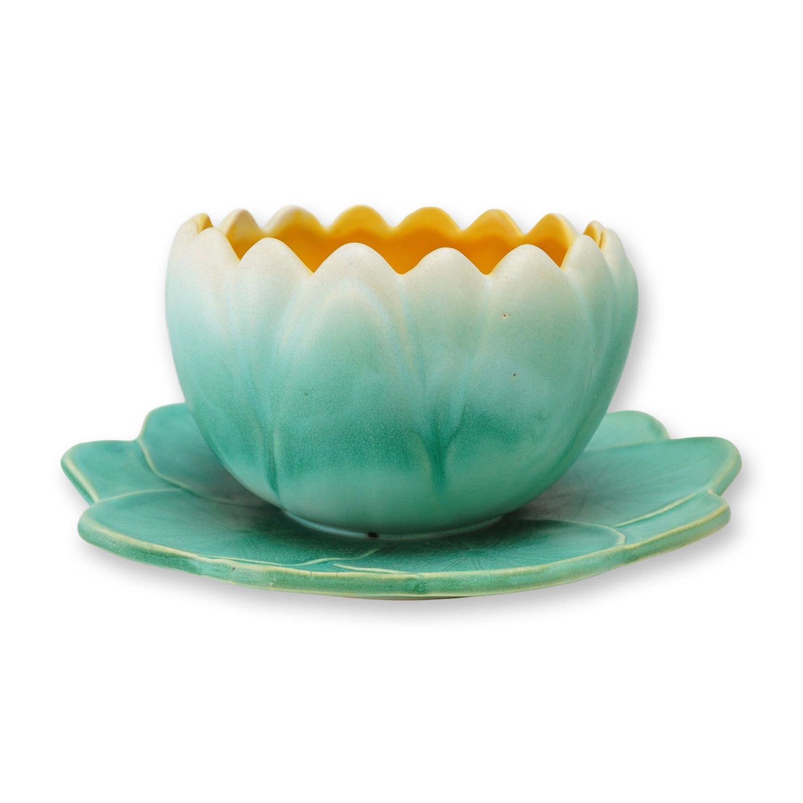 Weller Pottery Lily Pad Bowl, Pumila: A Weller Pottery bowl with affixed Lily pad plate in the Pumila pattern, dating to the 1920s. The ceramic bowl is modeled as a lotus blossom with a pointed petal exterior and a yellow interior. The ex