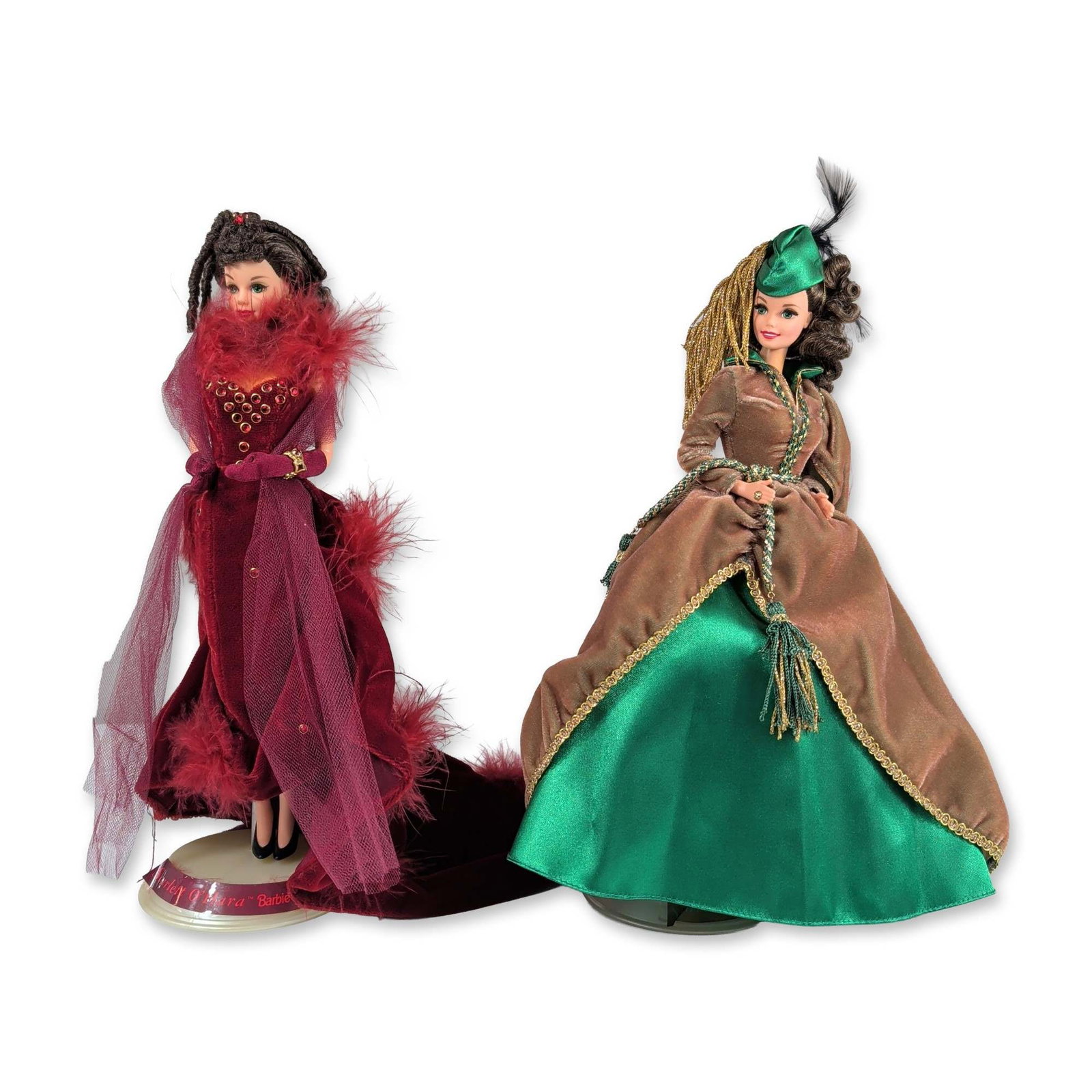 2pc Mattel Scarlett O'Hara Gone with the Wind Barbie: Mattel collector vinyl dolls depicting the character Scarlett OHara from the film Gone with the Wind. The pair includes two figures with rooted dark brown hair in period styles and fixed painted facia