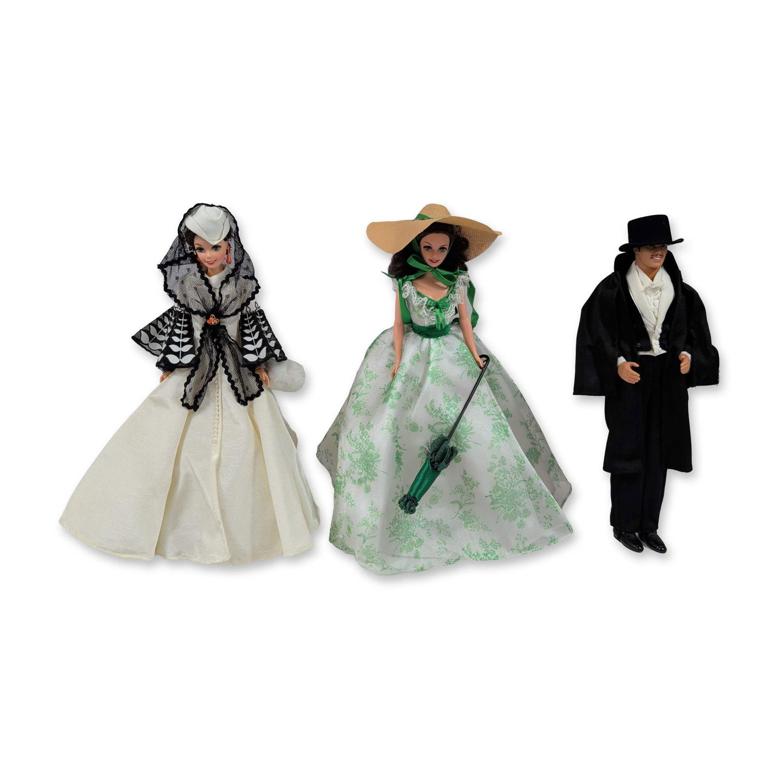 3pc Mattel Gone with the Wind Collector Dolls: Hollywood Legends Collection by Mattel. Group of three vinyl collector dolls based on characters from the 1939 film Gone with the Wind. The set includes Rhett Butler in formal black evening attire wit