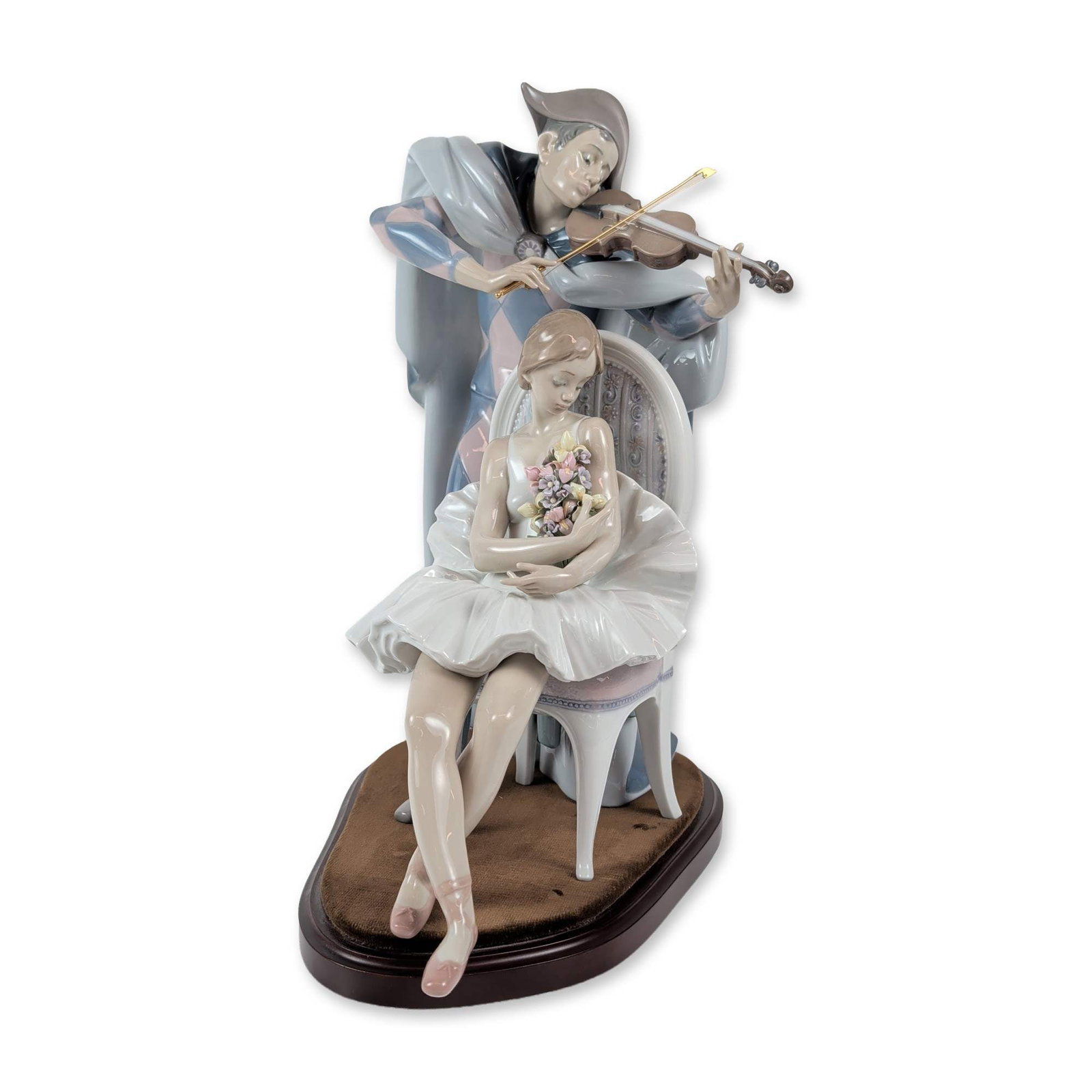 Lladro Jesters Serenade Porcelain Group 5932: Lladro (Spanish, 20th century). Jesters Serenade (Arlequin Enamorado), model 05932, porcelain sculptural group in polychrome glazed porcelain featuring a standing harlequin figure playing a violin for