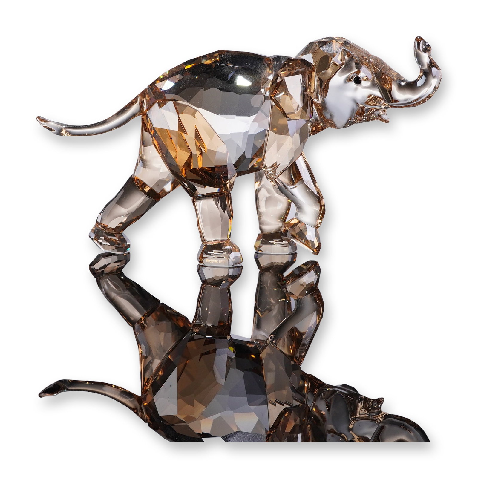 Swarovski SCS 2013 Young Elephant Figurine: Swarovski Crystal Society SCS young elephant crystal figurine, issued in 2013 as a companion to the Annual Edition Elephant Cinta. Designed by Elisabeth Adamer, the figurine is crafted in faceted Ligh