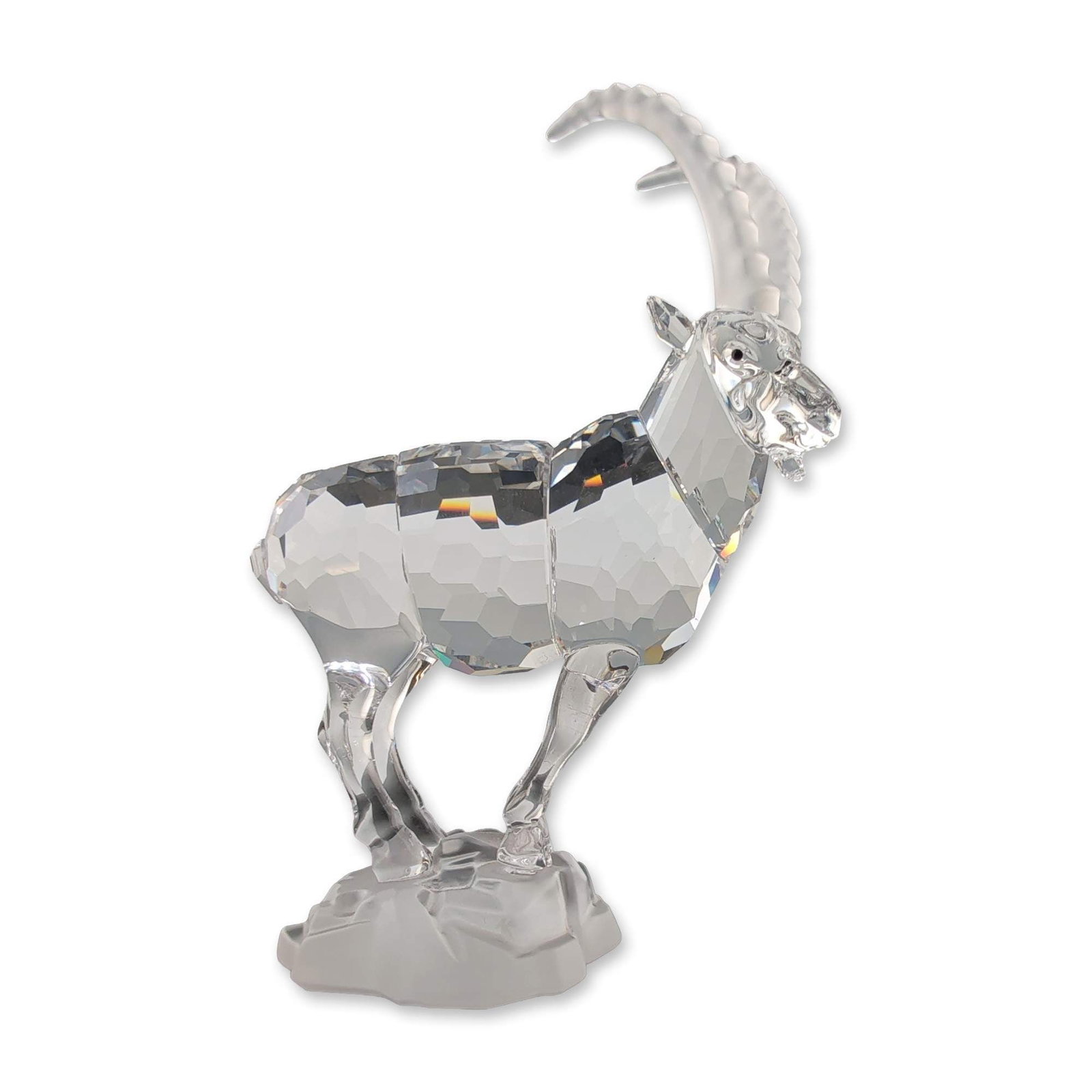 Swarovski Crystal Alpine Ibex Figurine: Swarovski lead crystal figurine of an Alpine Ibex, featuring a faceted clear crystal body and a frosted satin-finish crystal base and ridged horns. The figure is accented with two small, dark inset cr