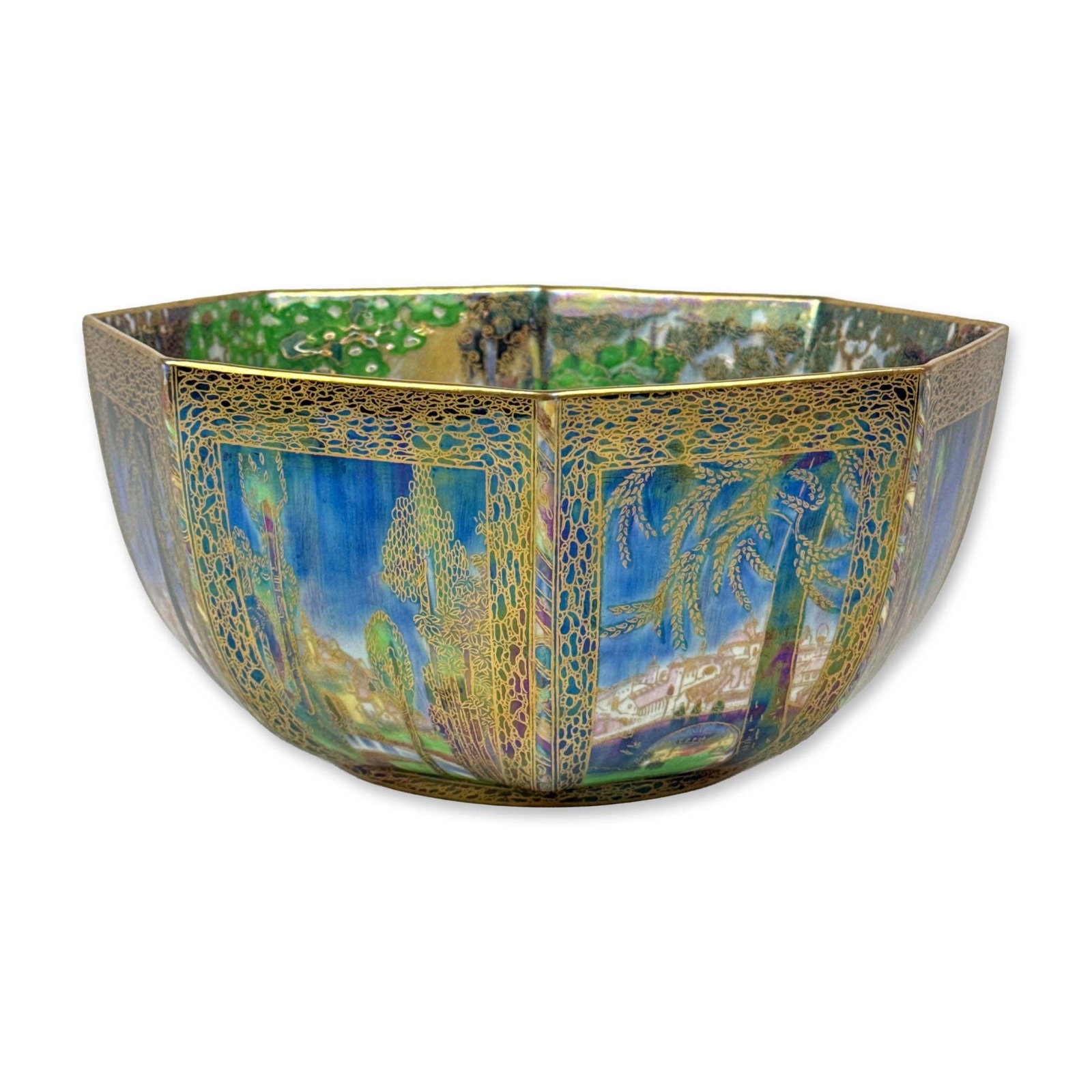 Wedgwood Fairyland Lustre Octagonal Dana Bowl, Z5125: Designed by Daisy Makeig-Jones, circa 1920. Featuring iridescent luster glazes and elaborate gold gilt decoration. The interior depicts a landscape with fairies and stylized trees in shades of green, 