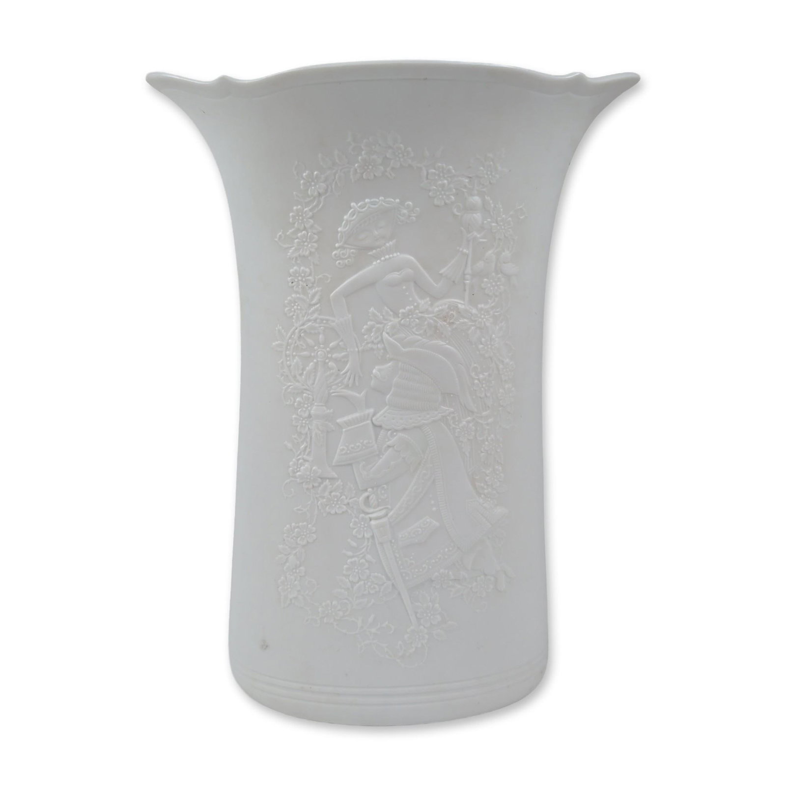 Kaiser West German Bisque Porcelain Vase: Kaiser Porzellan, West Germany. Flared oval vase in white bisque porcelain, featuring a raised-relief molded romantic scene of a couple in 18th-century attire framed by a floral garland cartouche. The