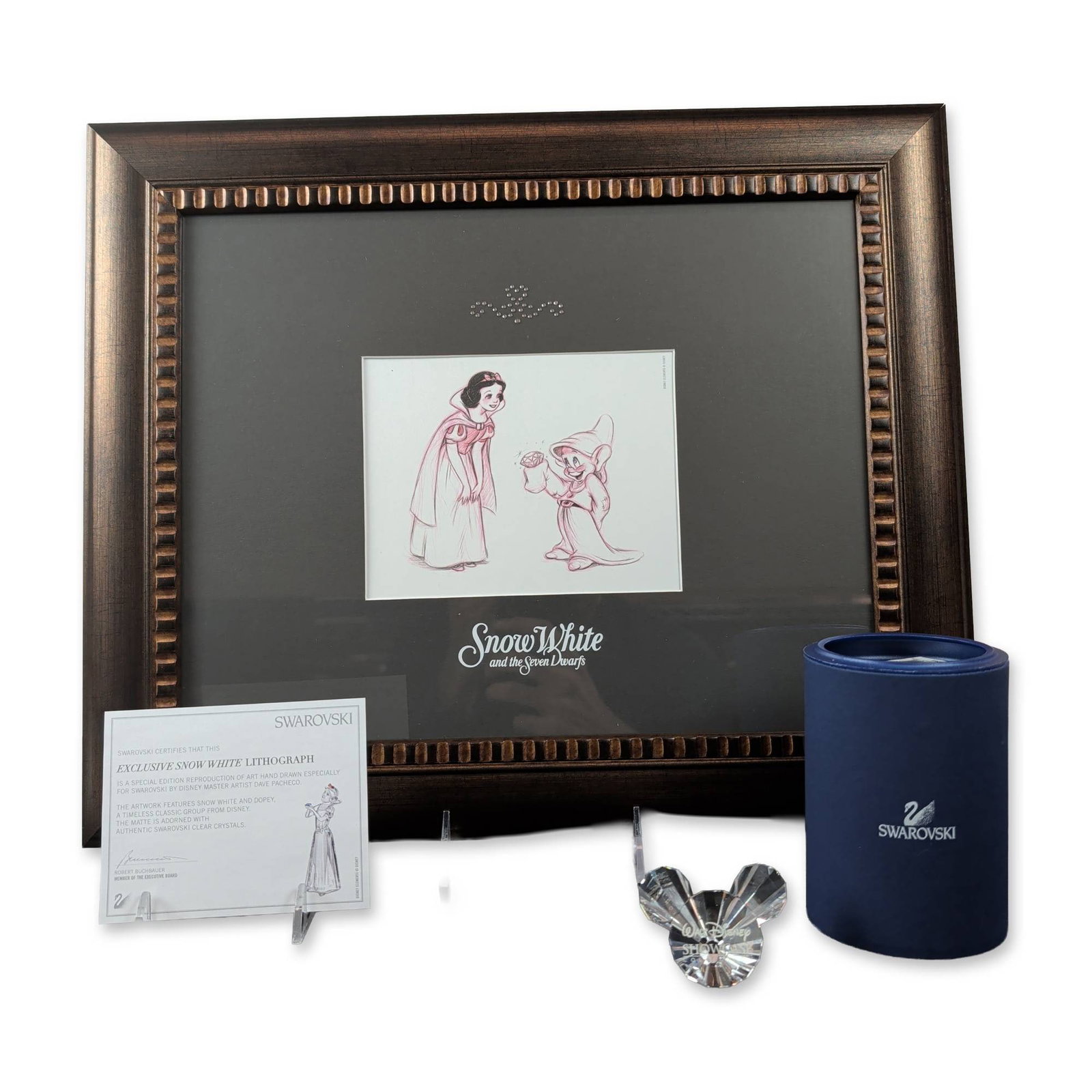 2pc Swarovski Disney Snow White Lithograph and Crystal Title Plaque: This Swarovski and Disney Walt Disney Showcase Collection set includes a framed special edition lithograph and a multi-faceted clear crystal plaque. The lithograph, a reproduction of an original hand-