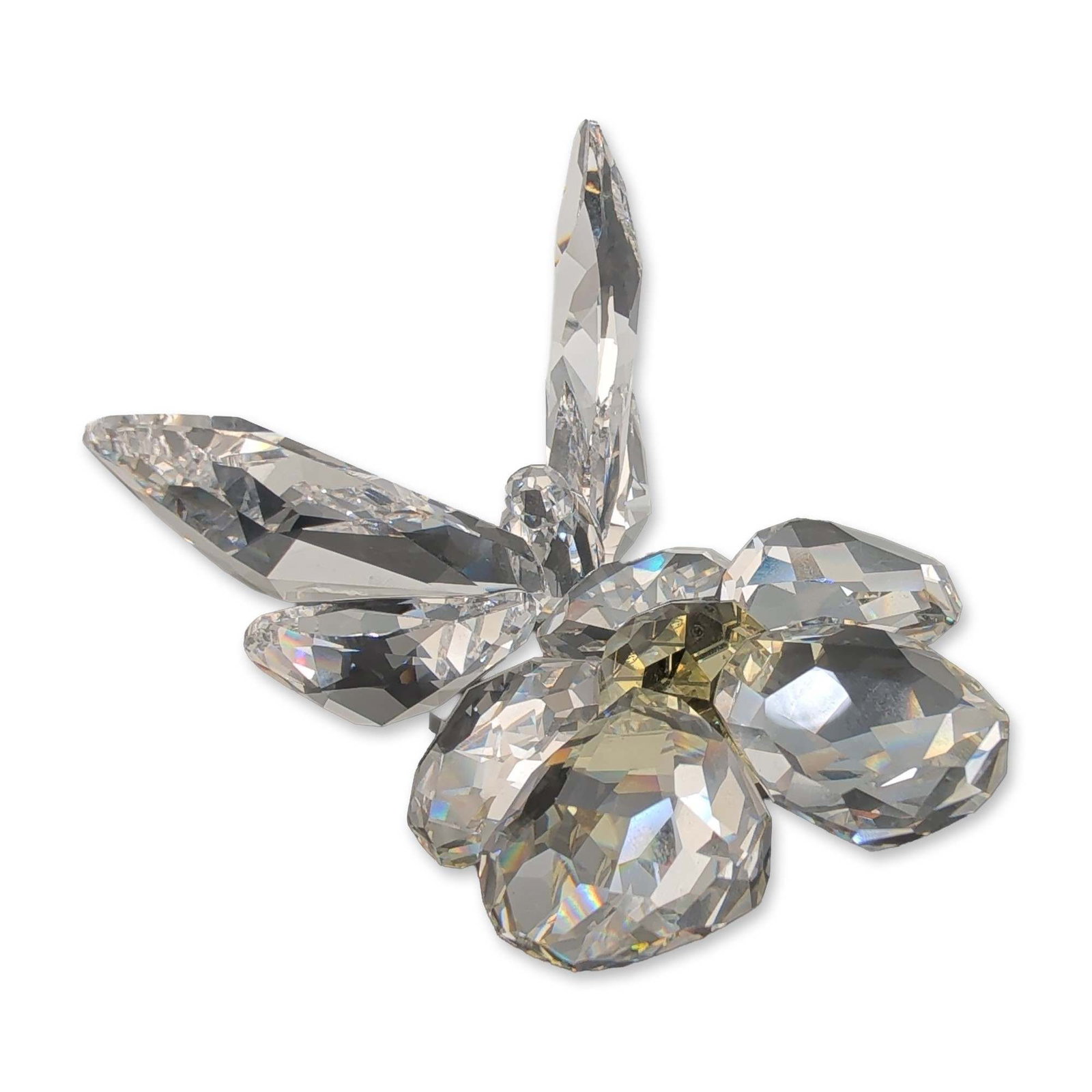 Swarovski Crystal Butterfly on Flower Figurine: The piece depicts a clear faceted butterfly landing on a stylized flower with five clear faceted petals and a pale-yellow faceted center. An etched Swarovski swan logo is visible on a facet of the cen